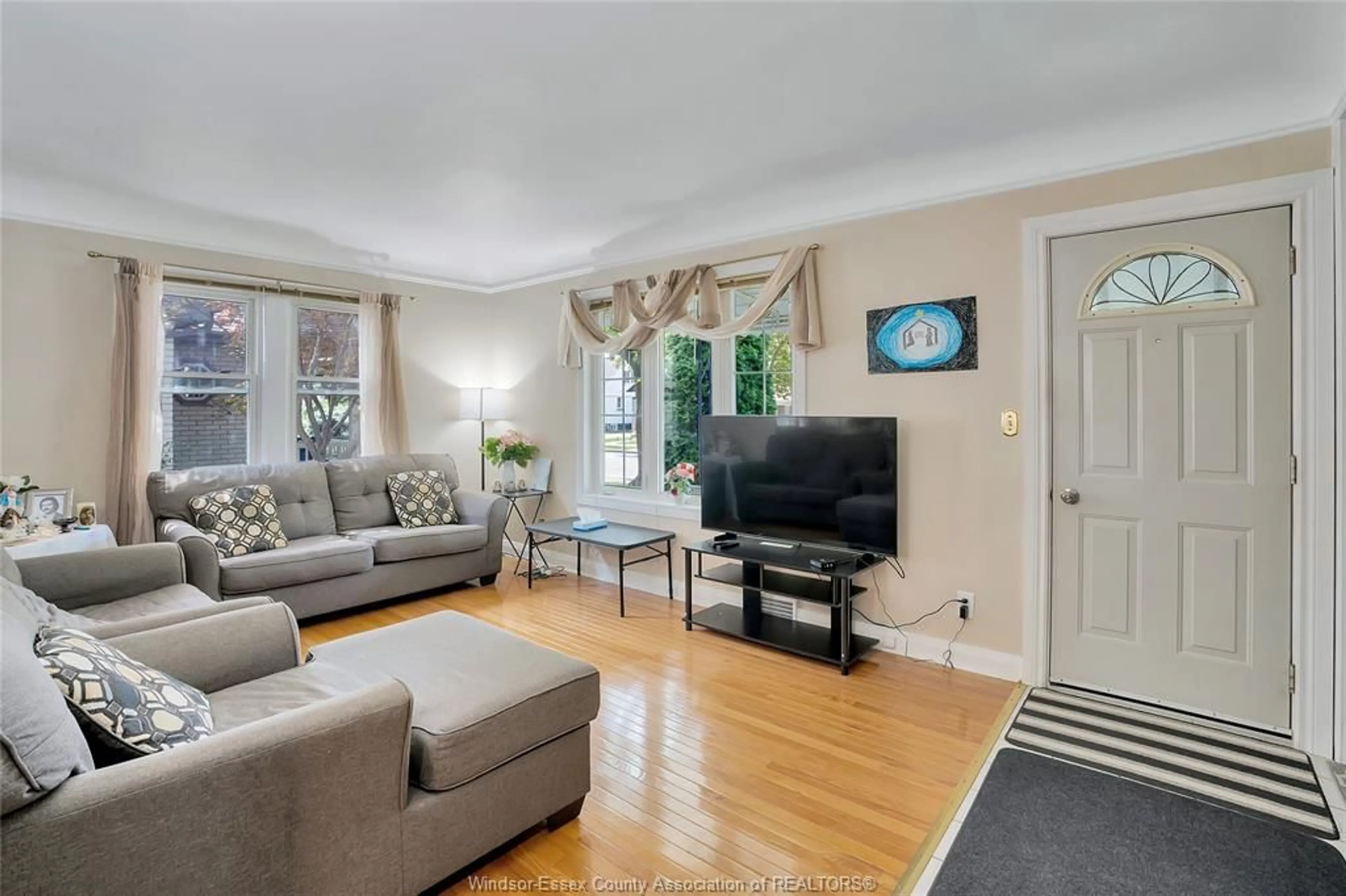 Living room with furniture, unknown for 1418 PILLETTE Rd, Windsor Ontario N8Y 3B9