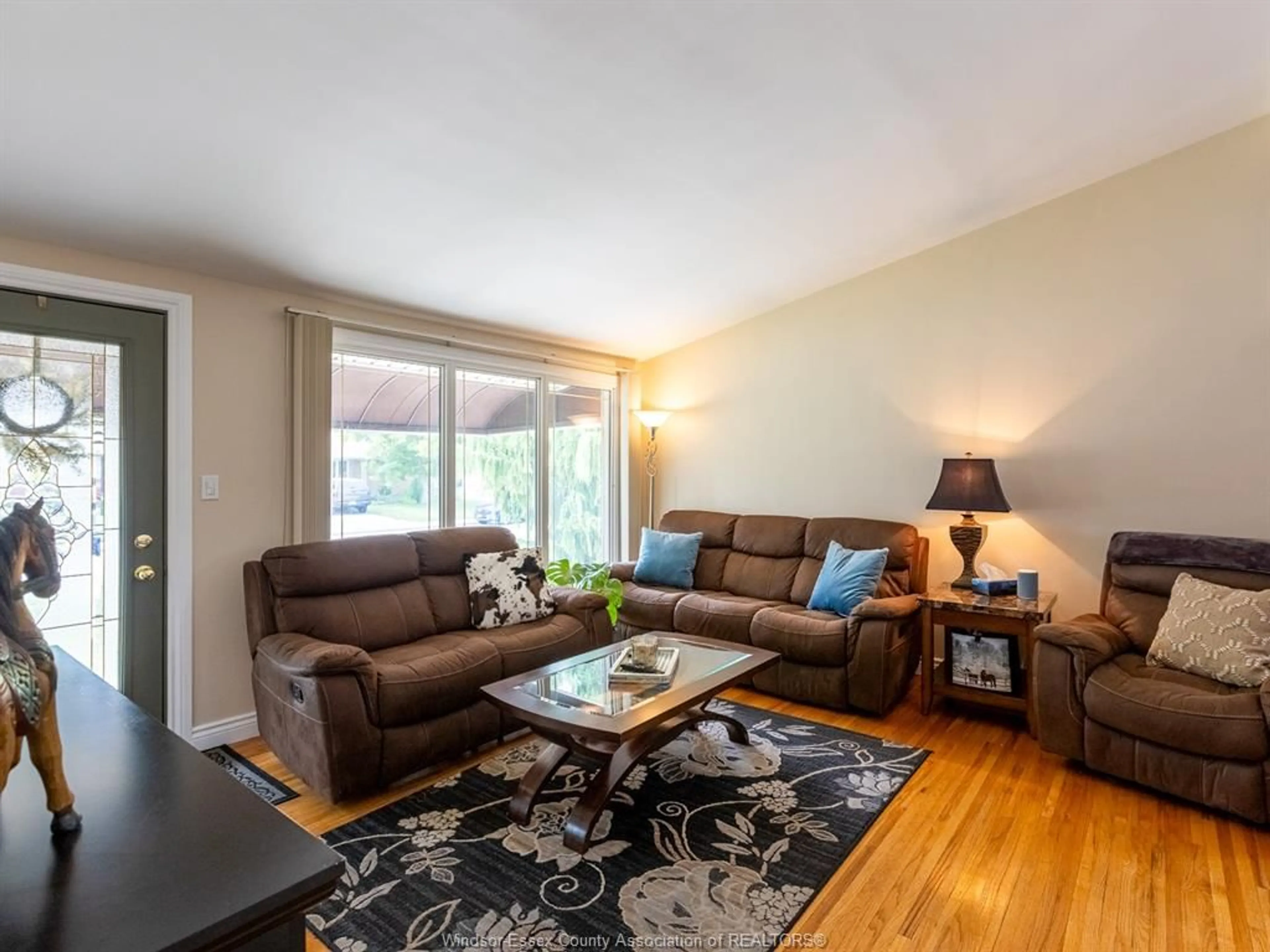Living room with furniture, wood/laminate floor for 976 WATSON, Windsor Ontario N8S 3T2