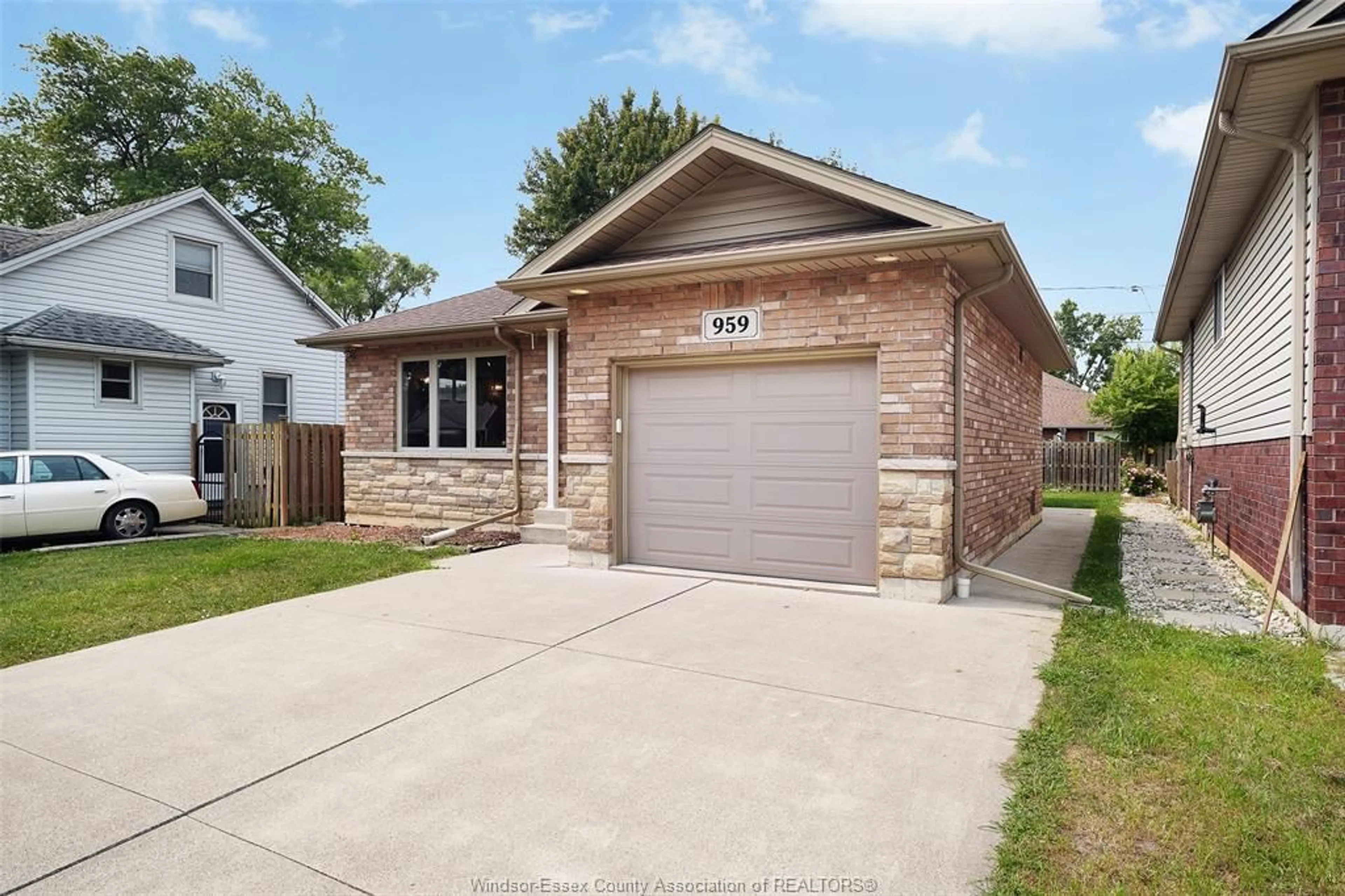 Home with brick exterior material, street for 959 Prado Place, Windsor Ontario N8S 2H4
