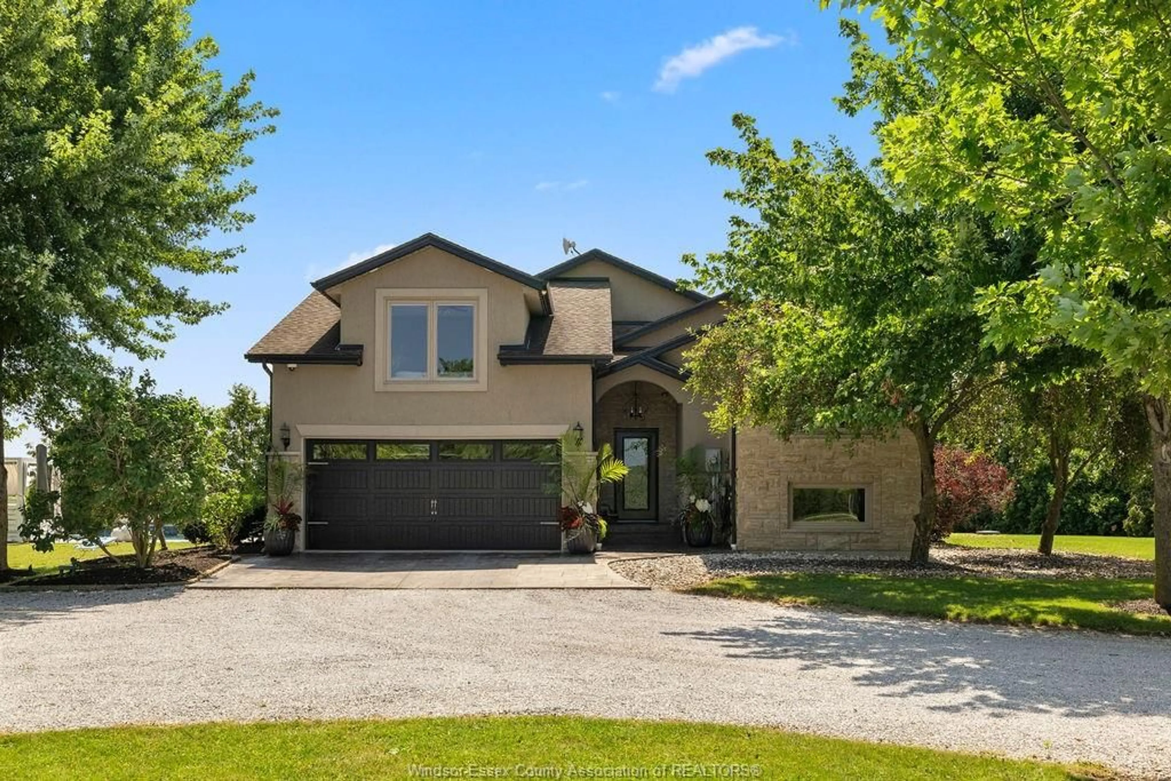 Home with brick exterior material, street for 1099 WALLS Rd, Lakeshore Ontario N8M 2X7