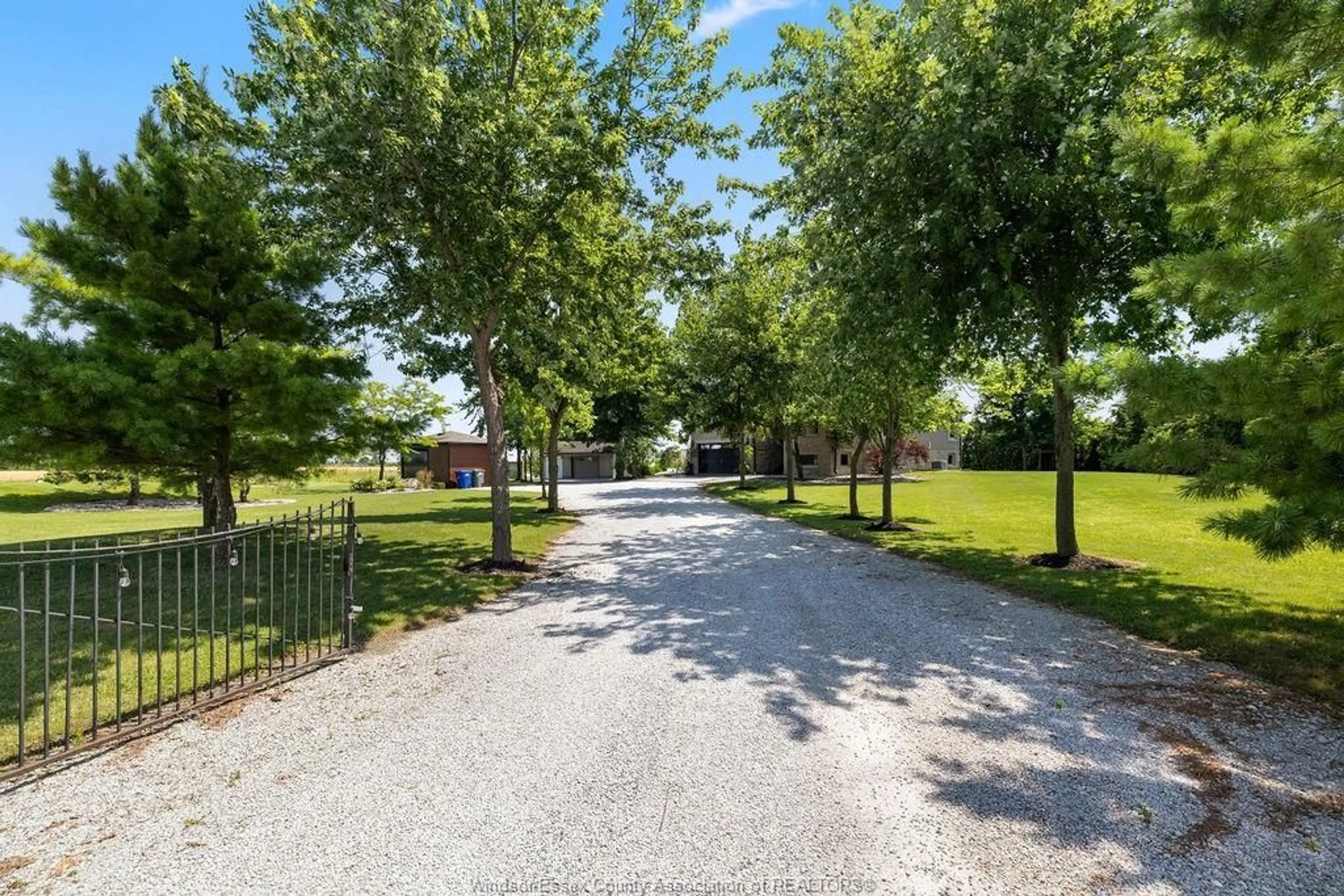 A pic from outside/outdoor area/front of a property/back of a property/a pic from drone, street for 1099 WALLS Rd, Lakeshore Ontario N8M 2X7