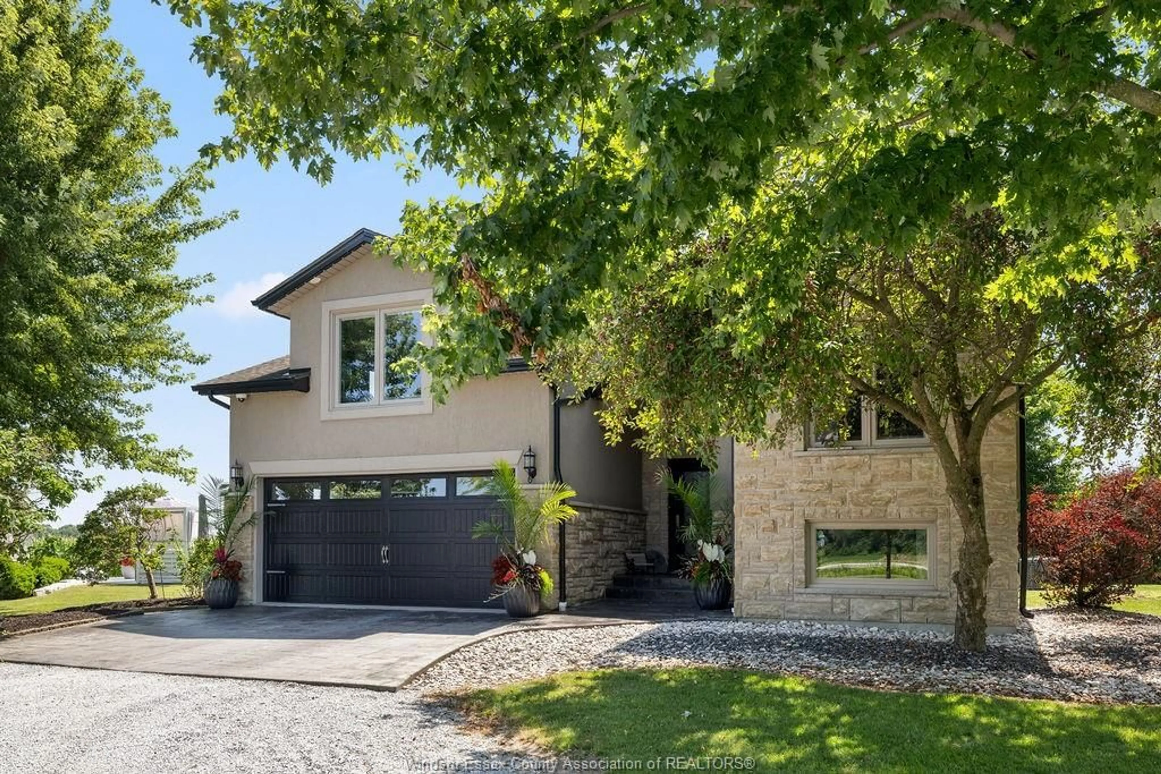 Home with brick exterior material, street for 1099 WALLS Rd, Lakeshore Ontario N8M 2X7