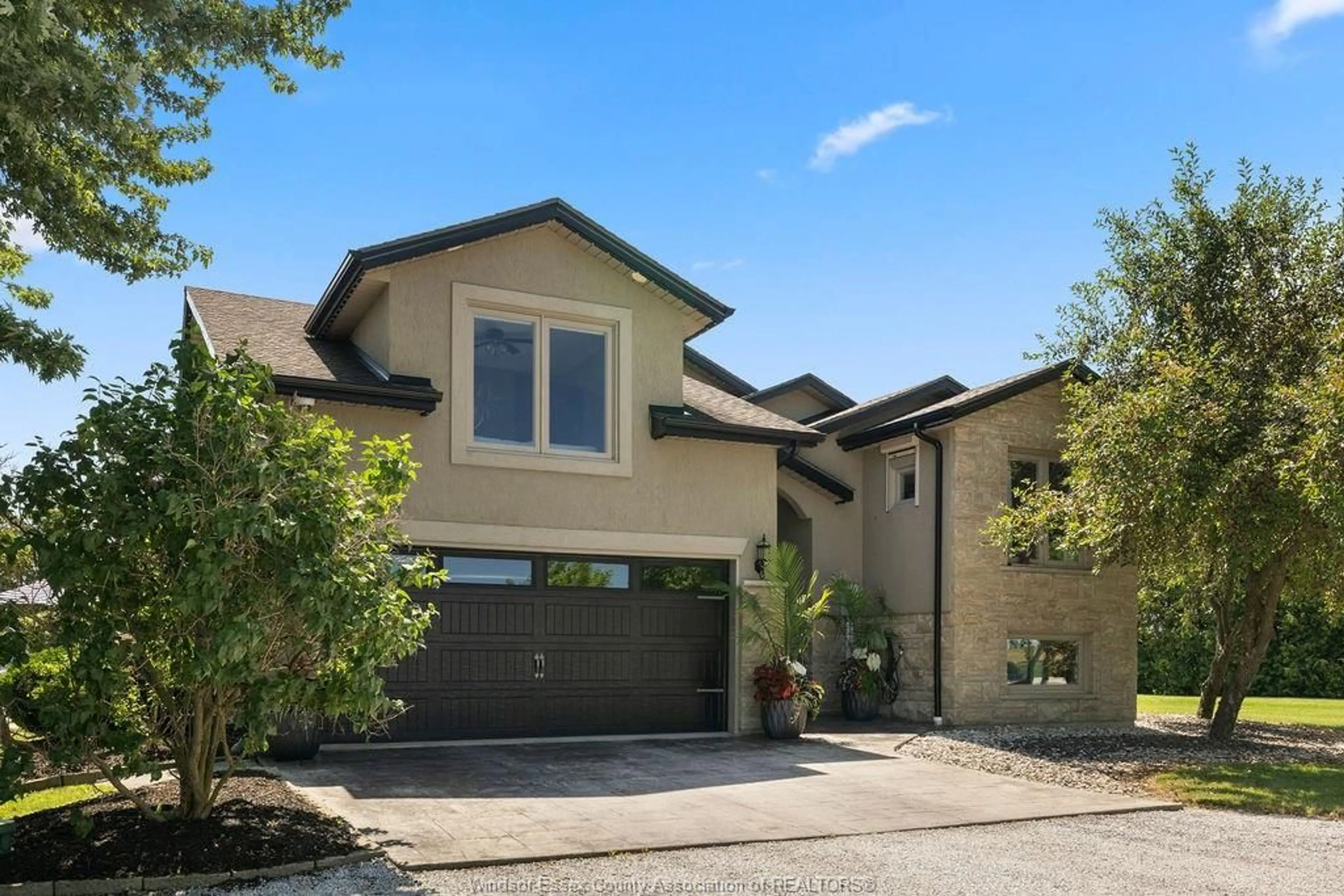 Home with brick exterior material, street for 1099 WALLS Rd, Lakeshore Ontario N8M 2X7