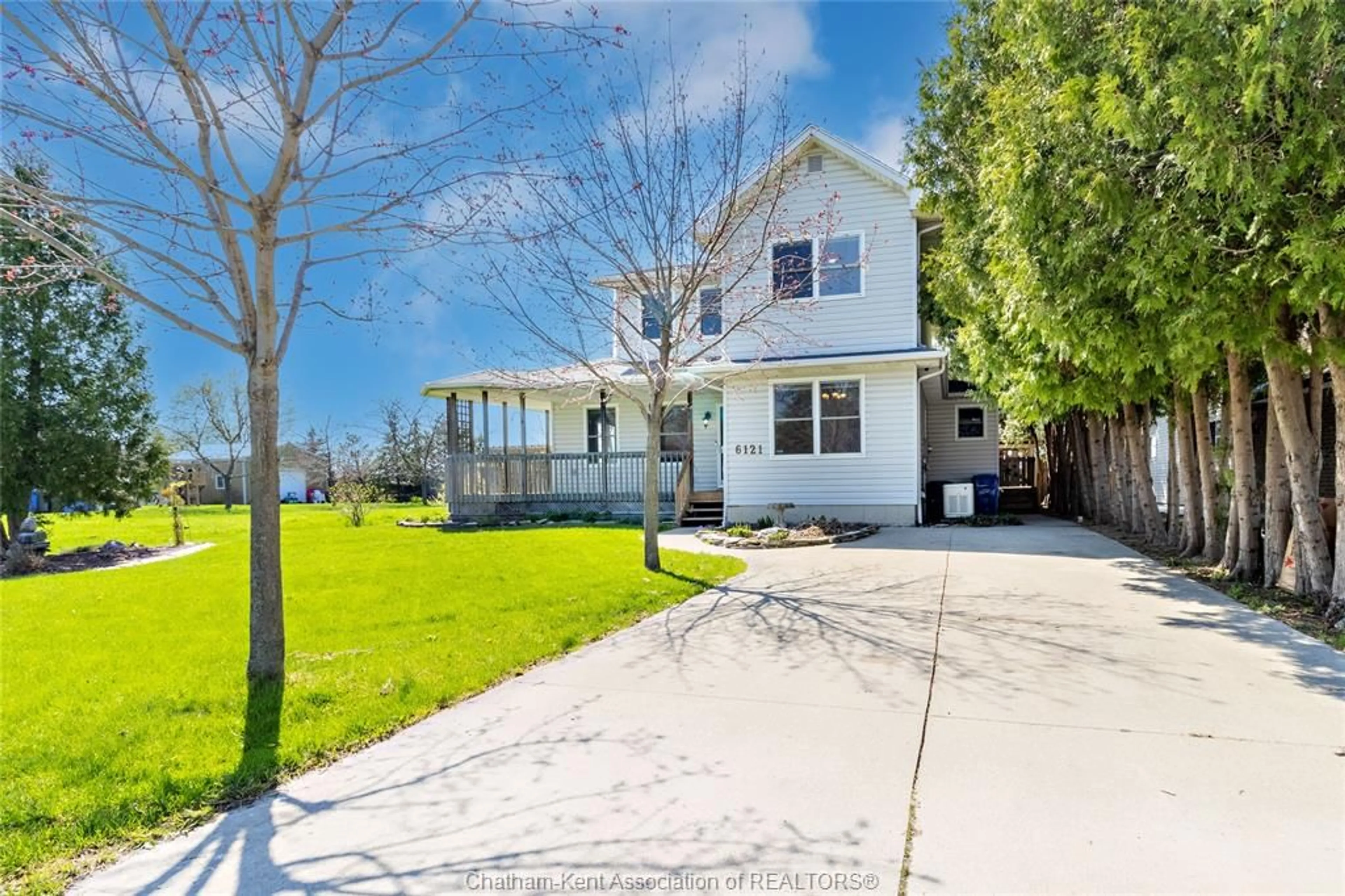 A pic from outside/outdoor area/front of a property/back of a property/a pic from drone, street for 6121 Emerson Ave, Comber Ontario N0P 1J0