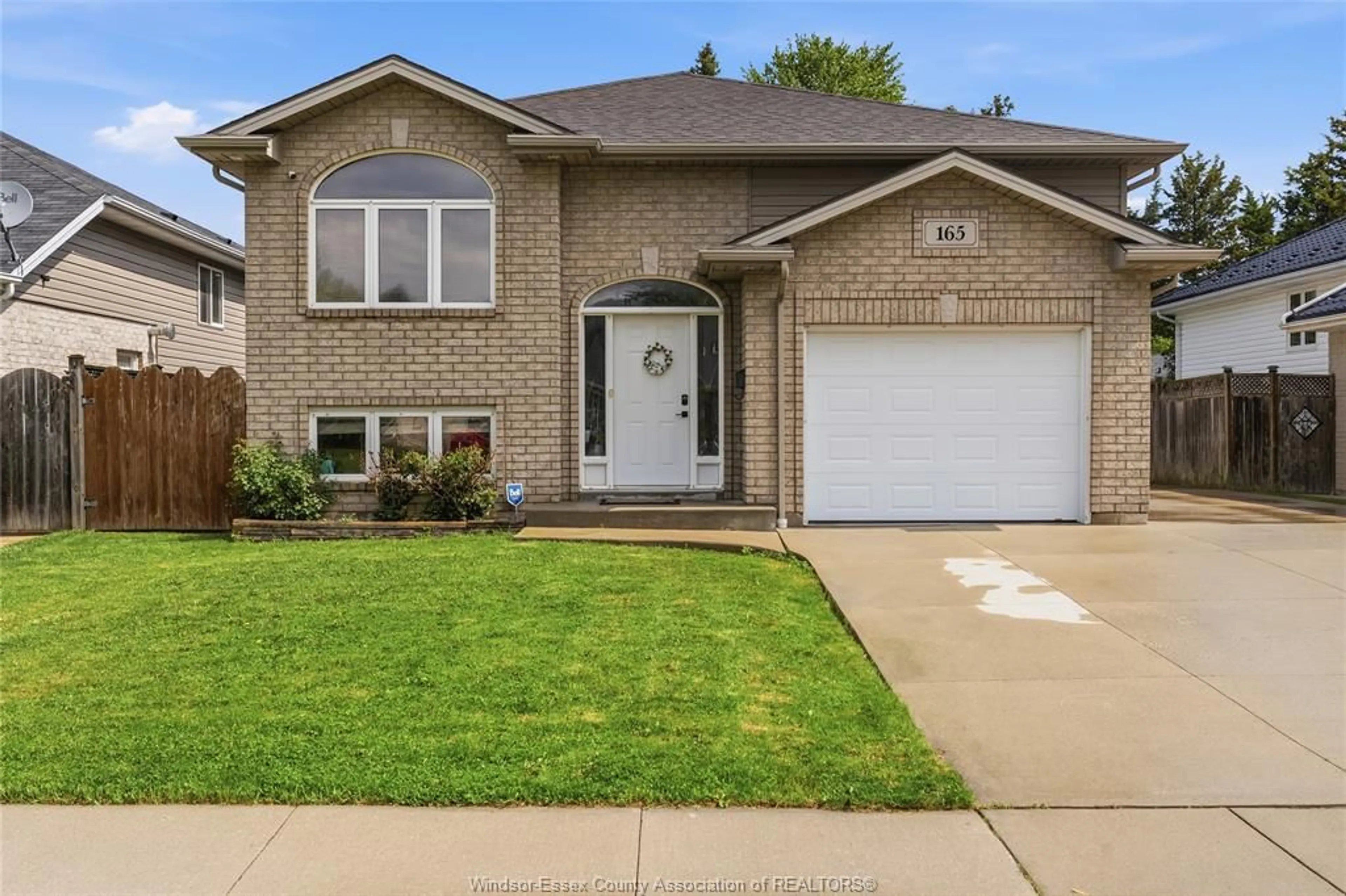 Home with brick exterior material, street for 165 THOMAS Ave, Wallaceburg Ontario N8A 5H5