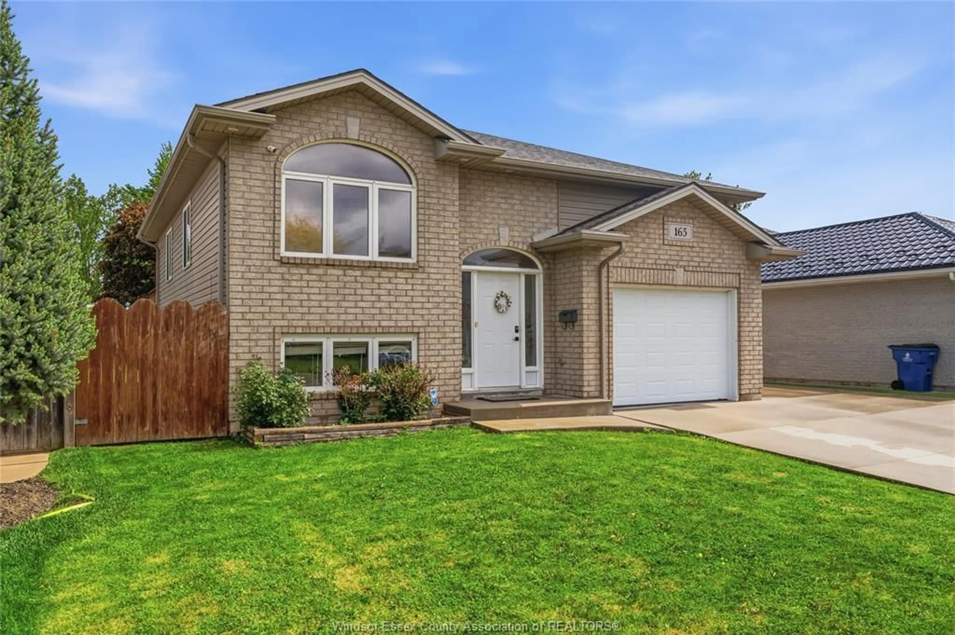 Home with brick exterior material, street for 165 THOMAS Ave, Wallaceburg Ontario N8A 5H5