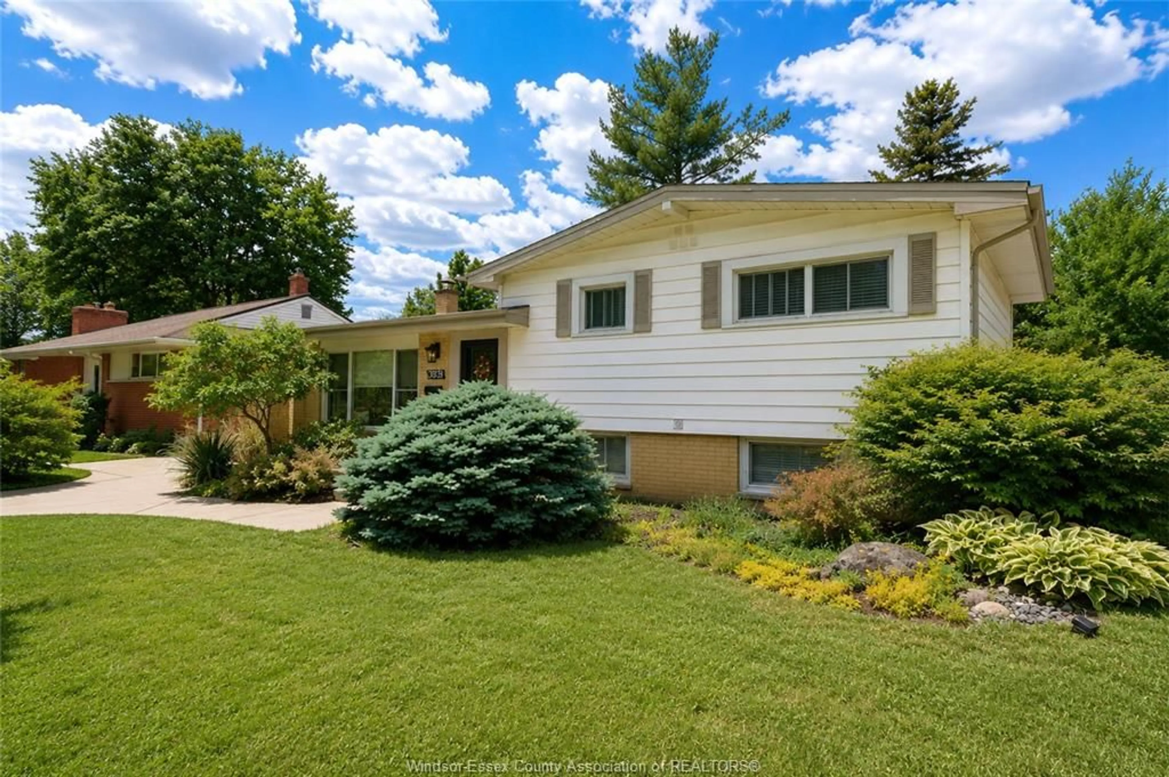 Home with vinyl exterior material, street for 3939 LONGFELLOW, Windsor Ontario N9G 2B4