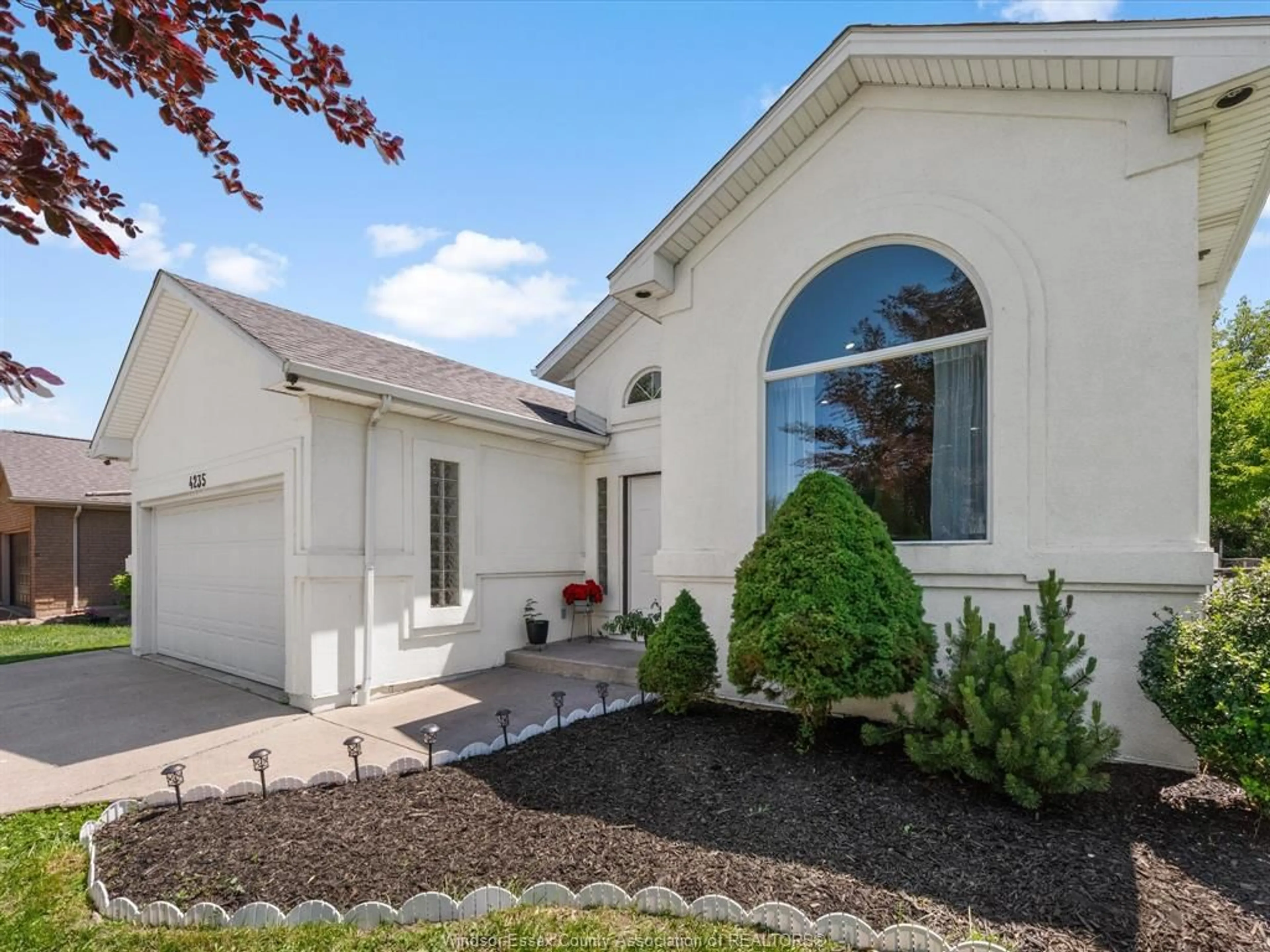 Home with vinyl exterior material, street for 4235 PROVIDENCE Cres, Windsor Ontario N9G 2V3