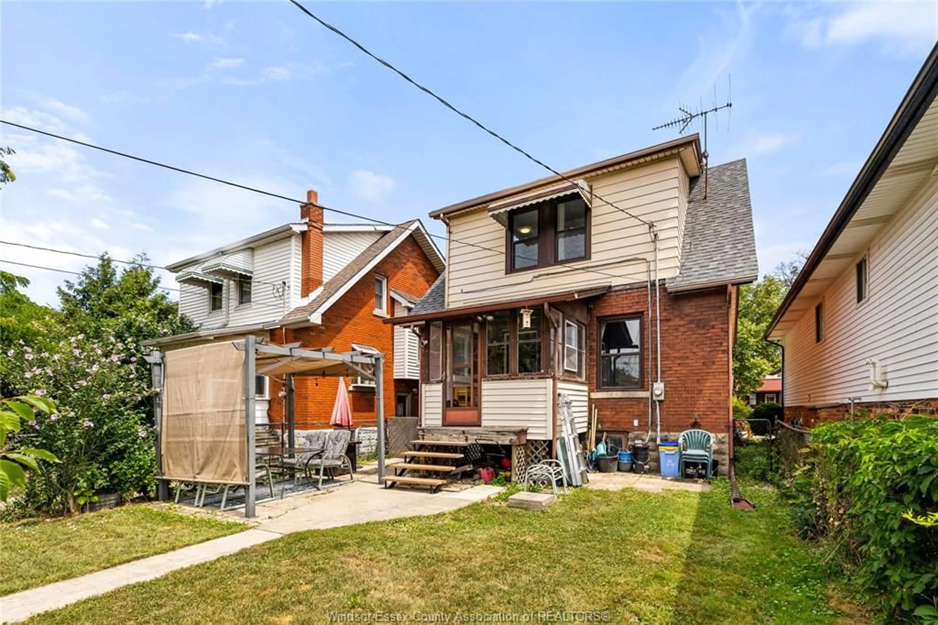Home with brick exterior material, street for 1033 CHURCH St, Windsor Ontario N9A 4V3
