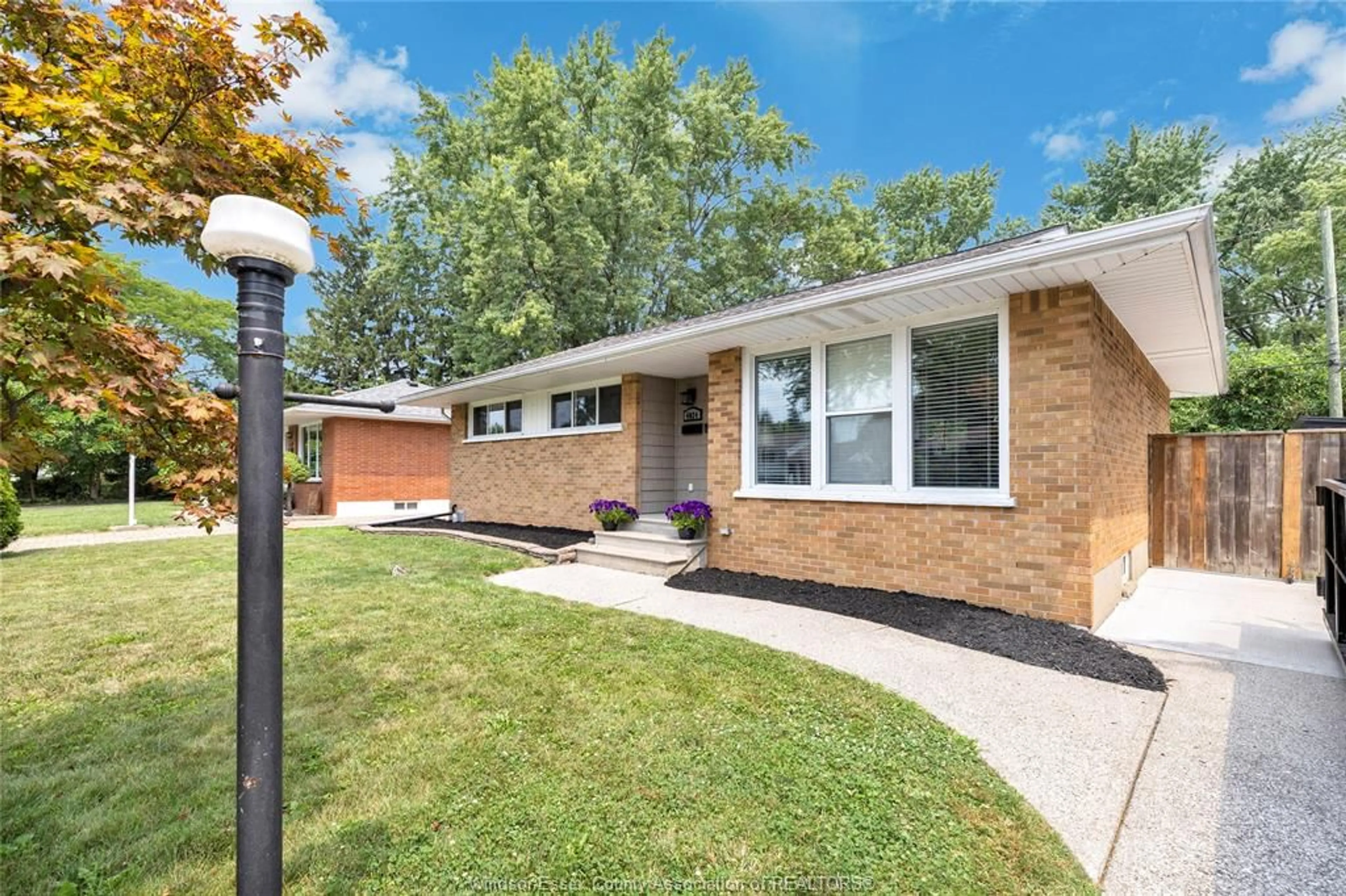 Home with brick exterior material, street for 4024 LONGFELLOW, Windsor Ontario N9G 2B6