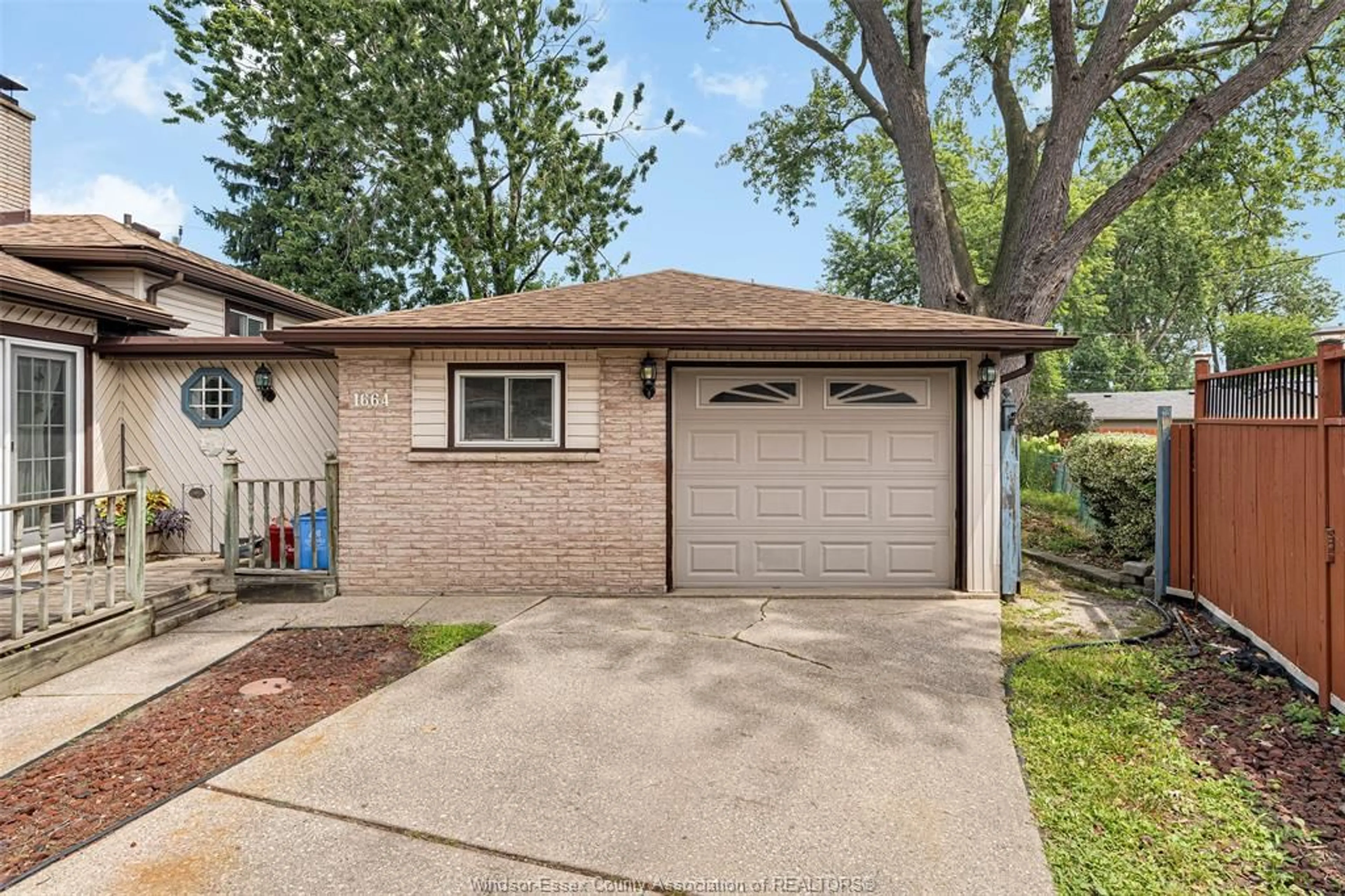 Home with brick exterior material, street for 1664 GREENVIEW Cres, Windsor Ontario N9C 2E9