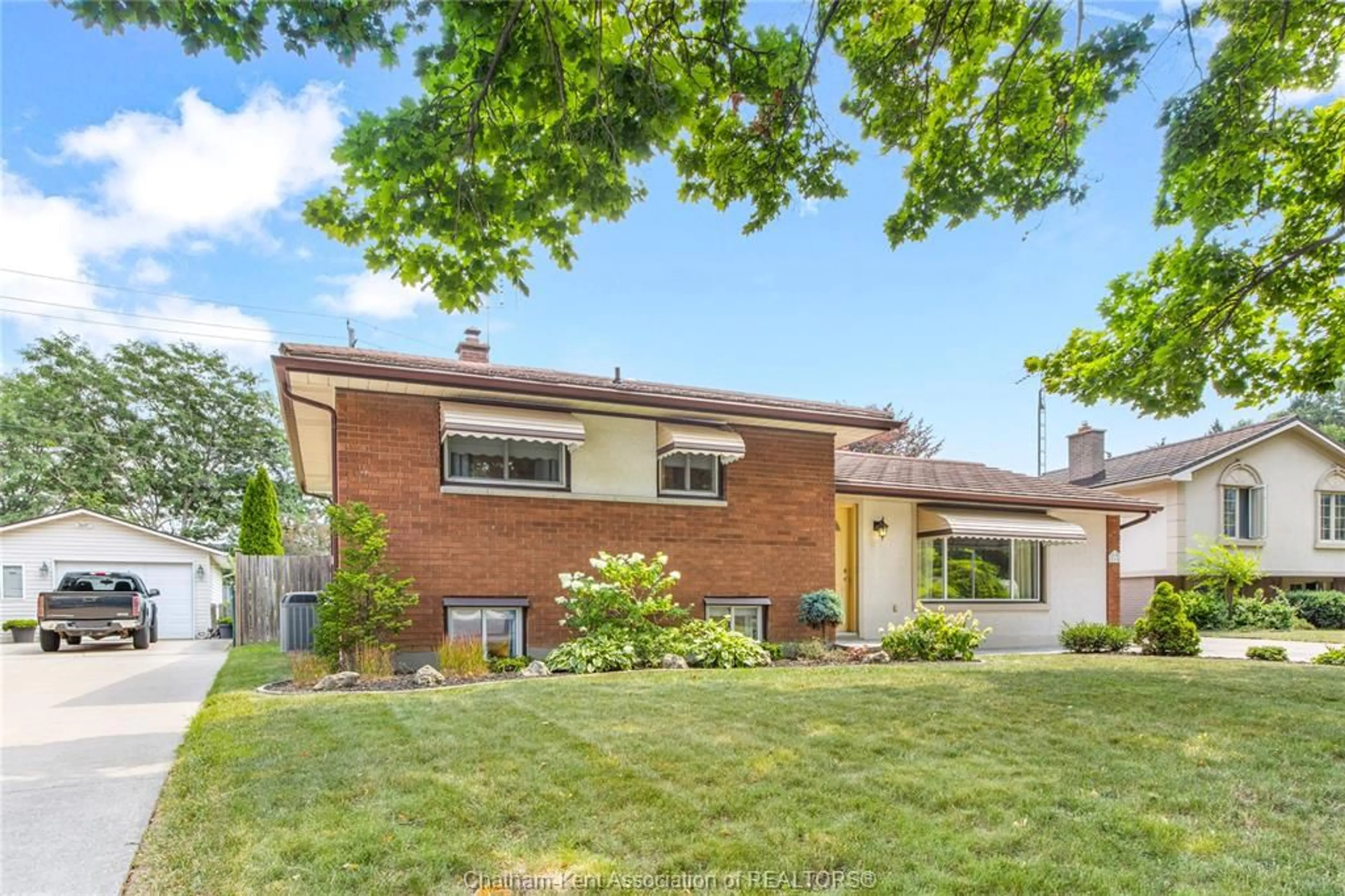 Home with brick exterior material, street for 214 BALDOON Rd, Chatham Ontario N7L 1E3