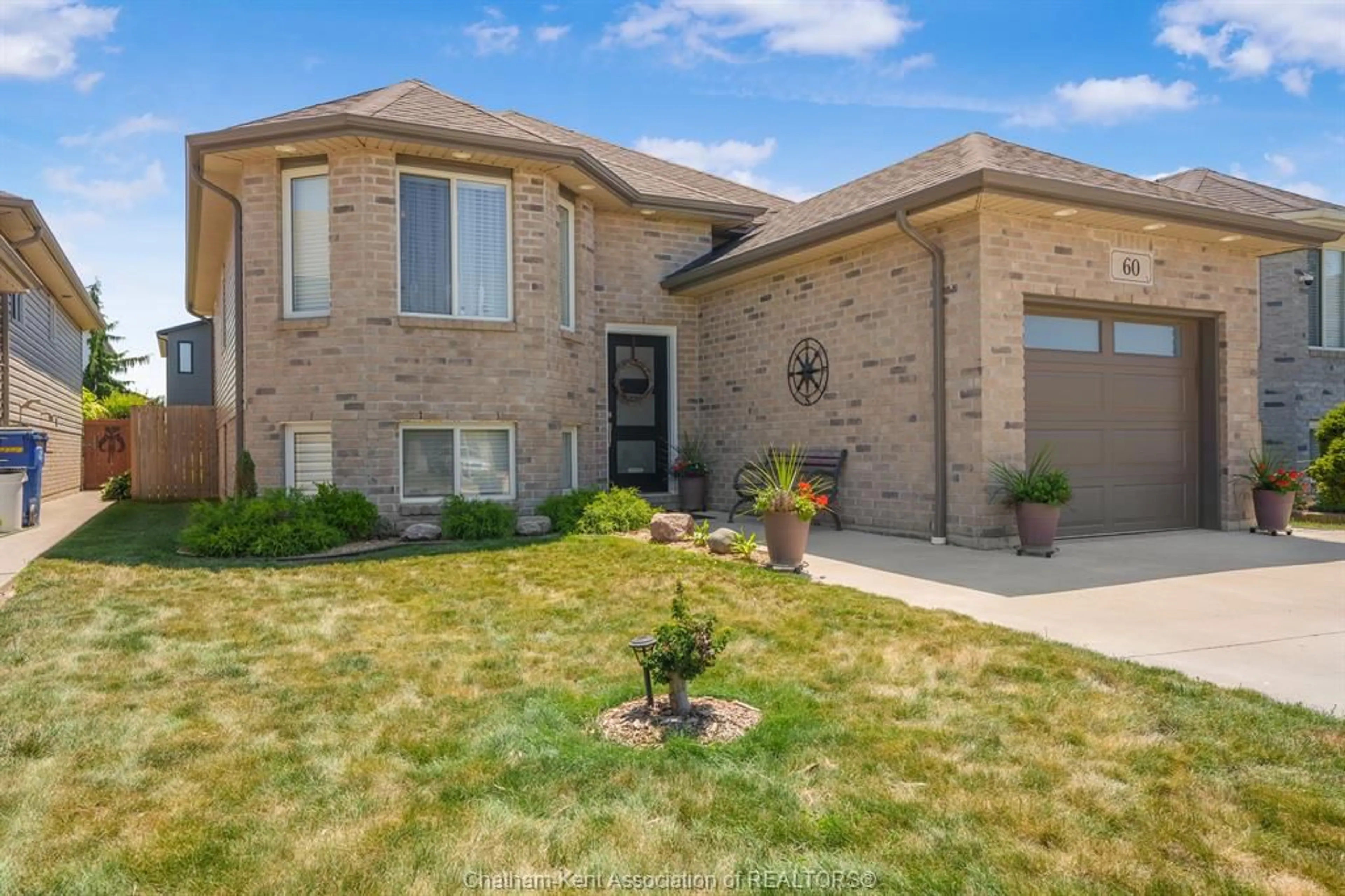Home with brick exterior material, street for 60 Manning Dr, Chatham Ontario N7M 6G3