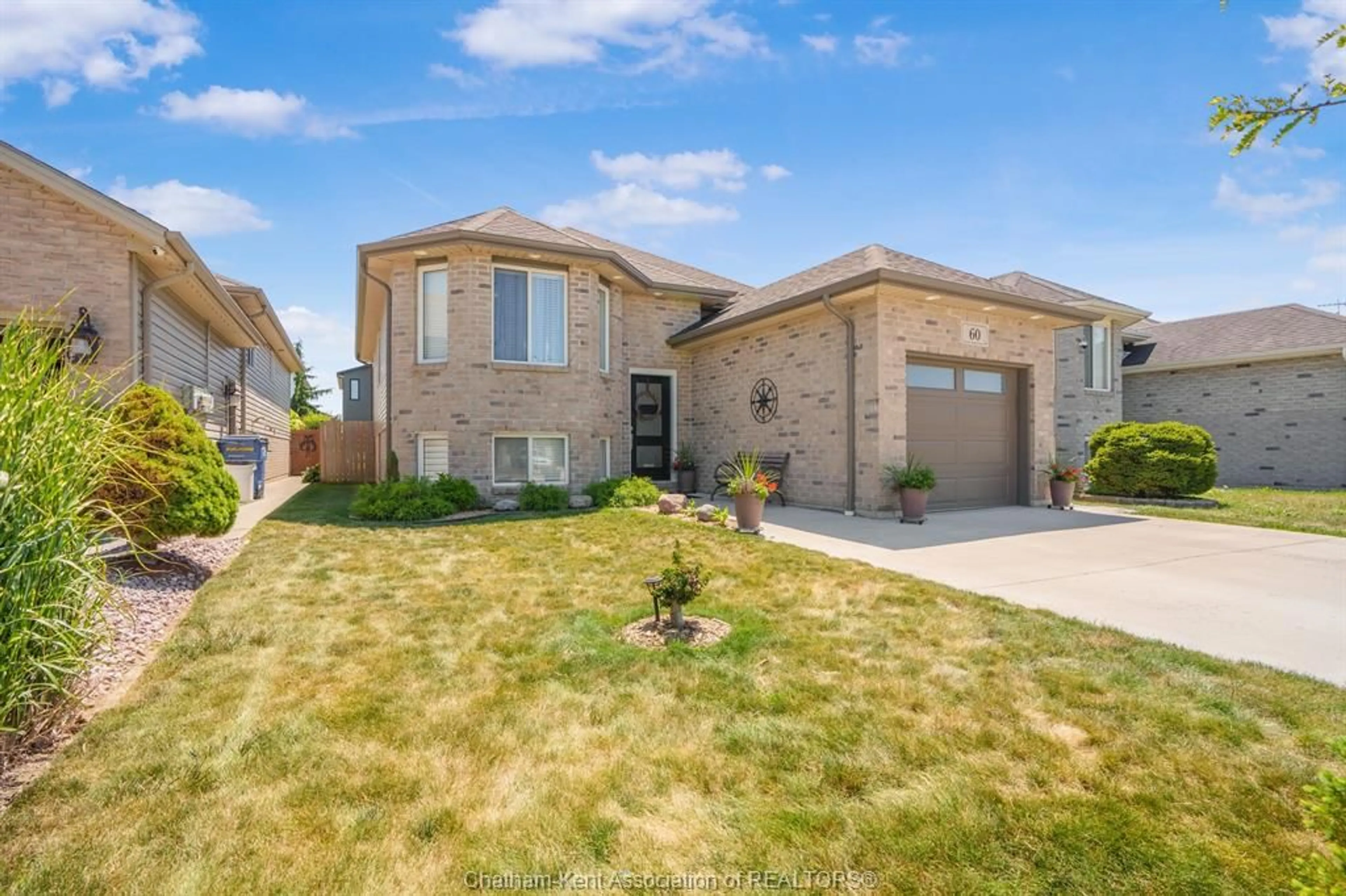 Home with brick exterior material, street for 60 Manning Dr, Chatham Ontario N7M 6G3
