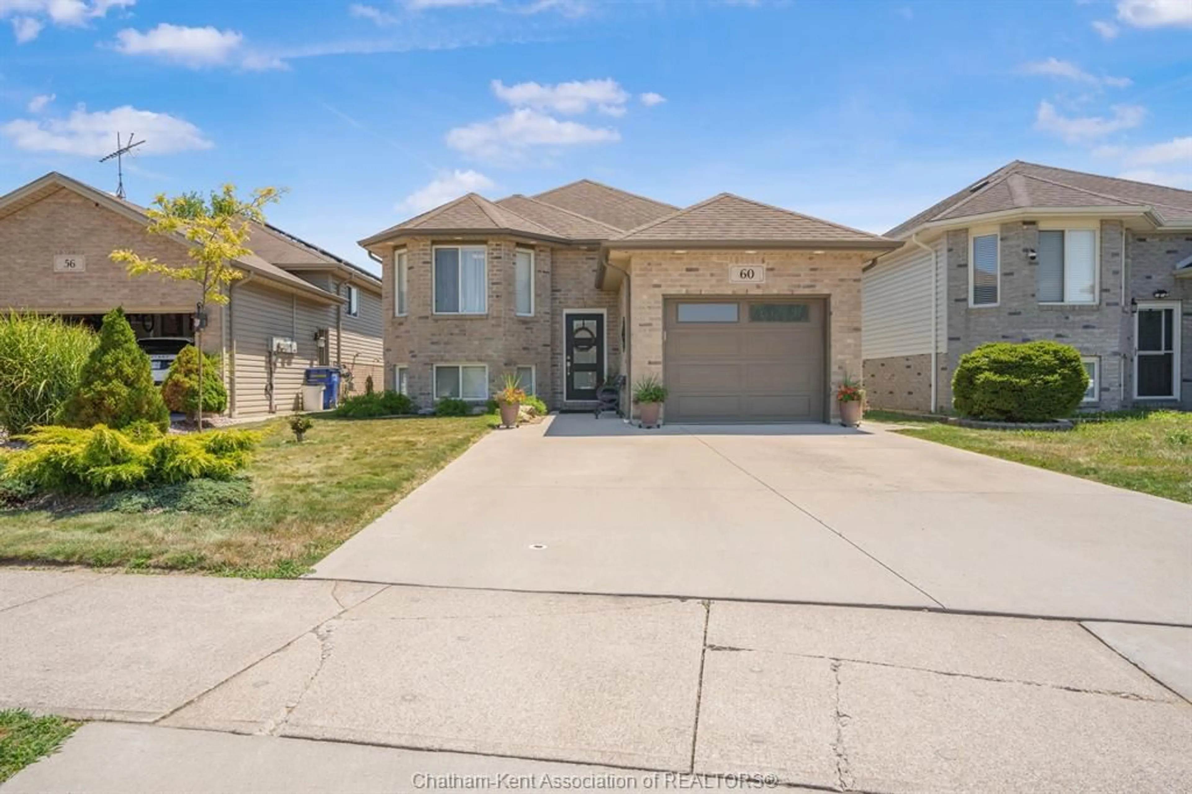 Home with brick exterior material, street for 60 Manning Dr, Chatham Ontario N7M 6G3