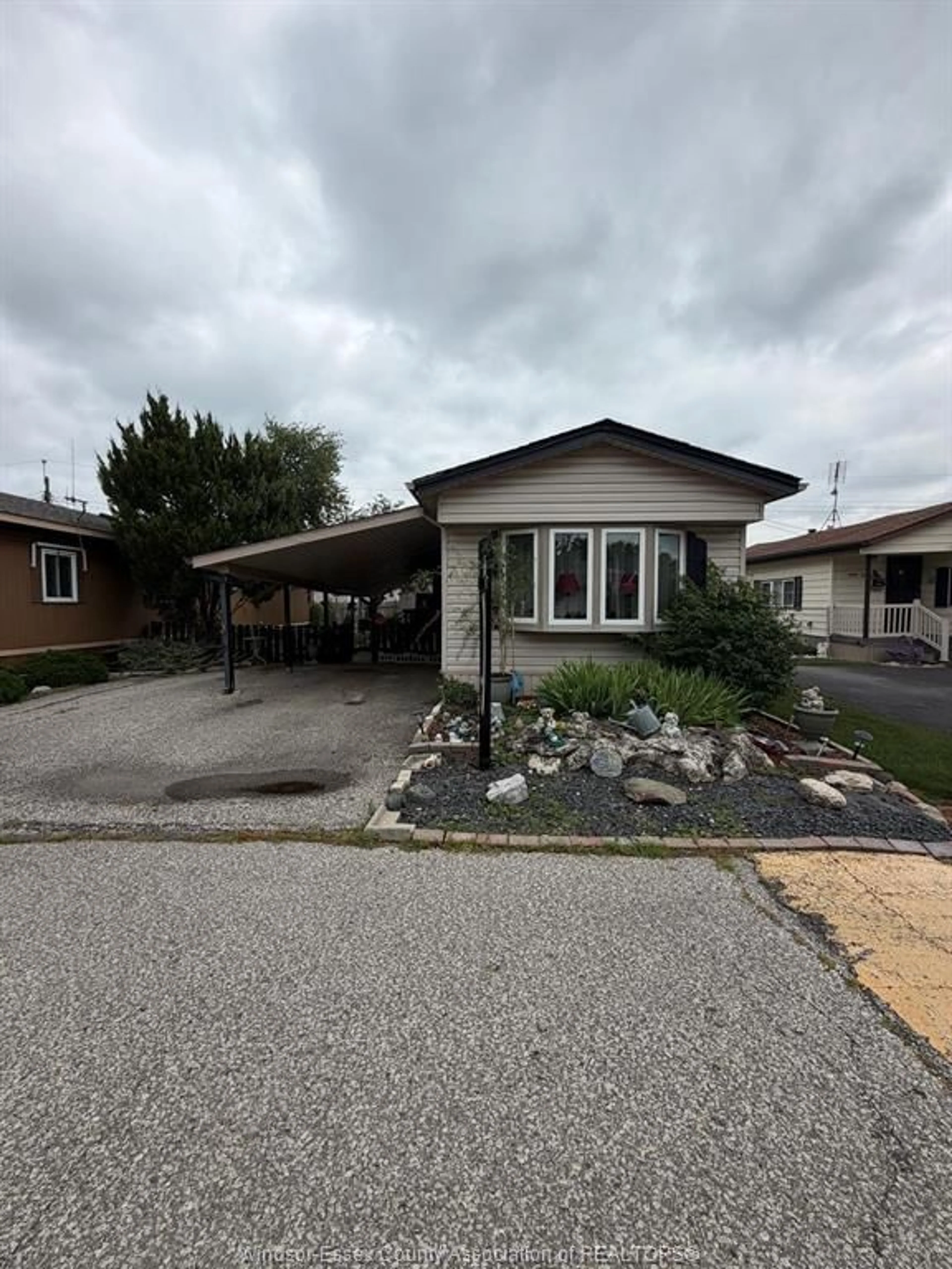 Home with vinyl exterior material, street for 80 SUNCREST Dr, Lakeshore Ontario N8N 2P9