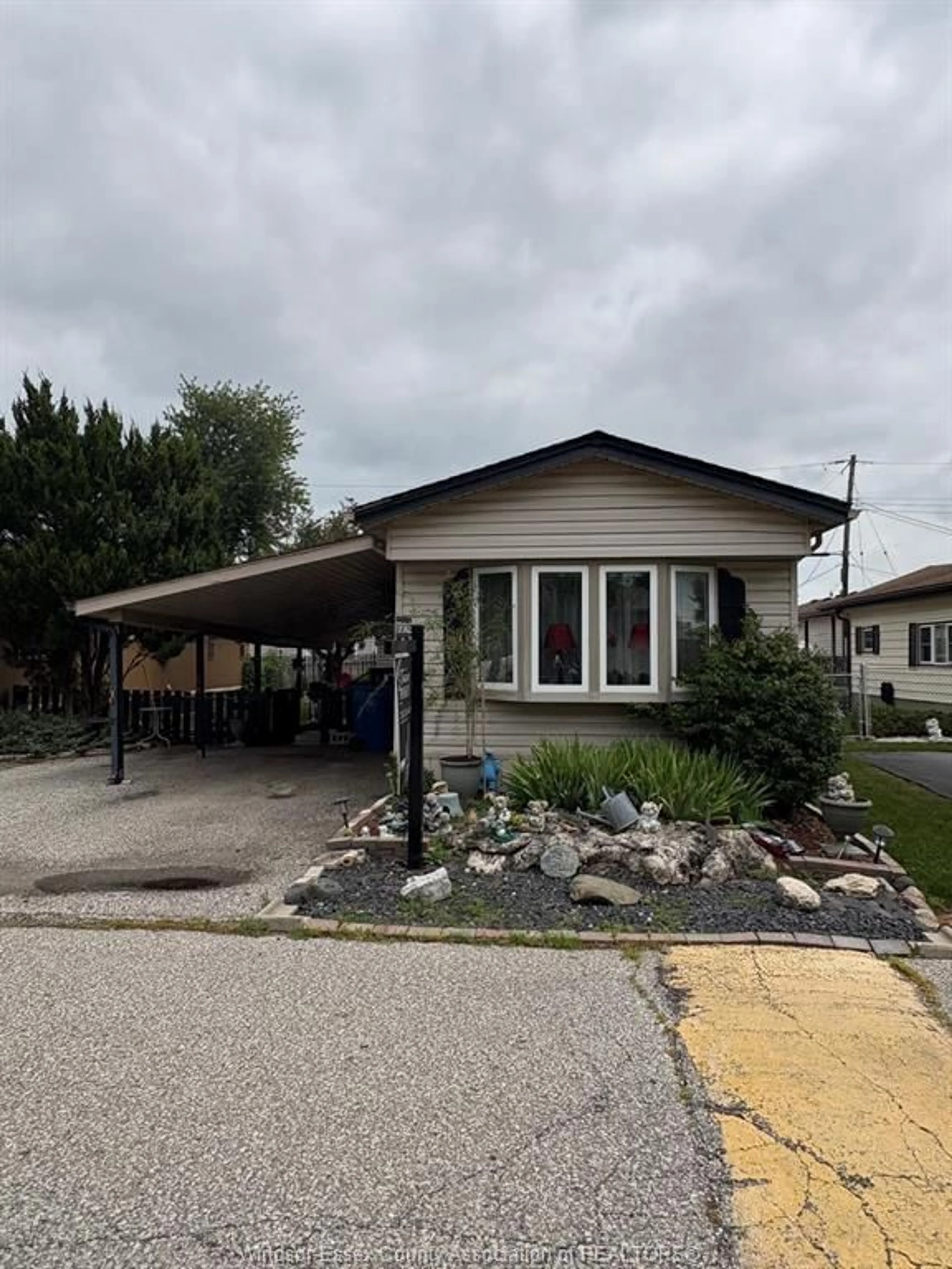 Home with vinyl exterior material, street for 80 SUNCREST Dr, Lakeshore Ontario N8N 2P9