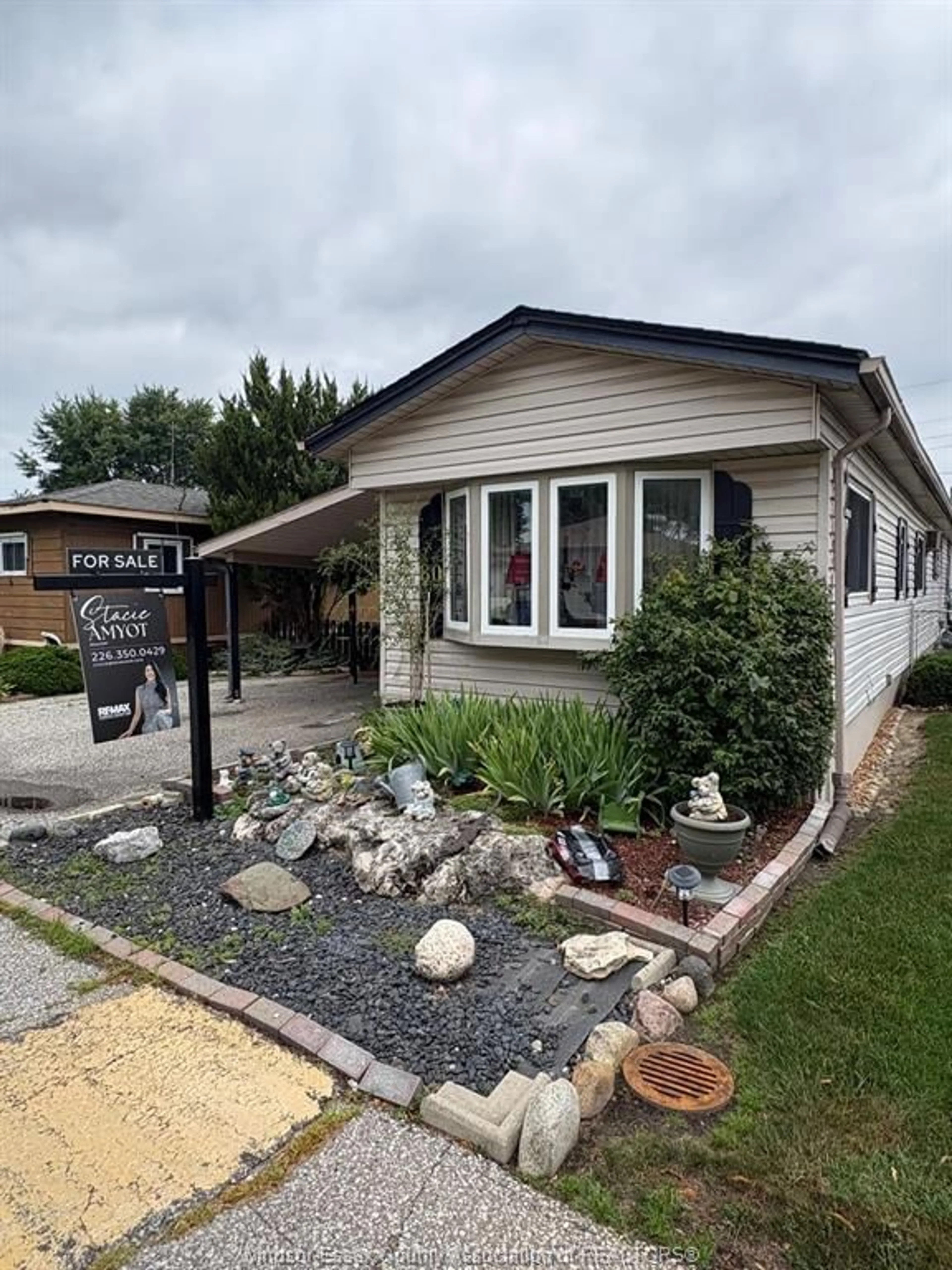 Home with vinyl exterior material, street for 80 SUNCREST Dr, Lakeshore Ontario N8N 2P9