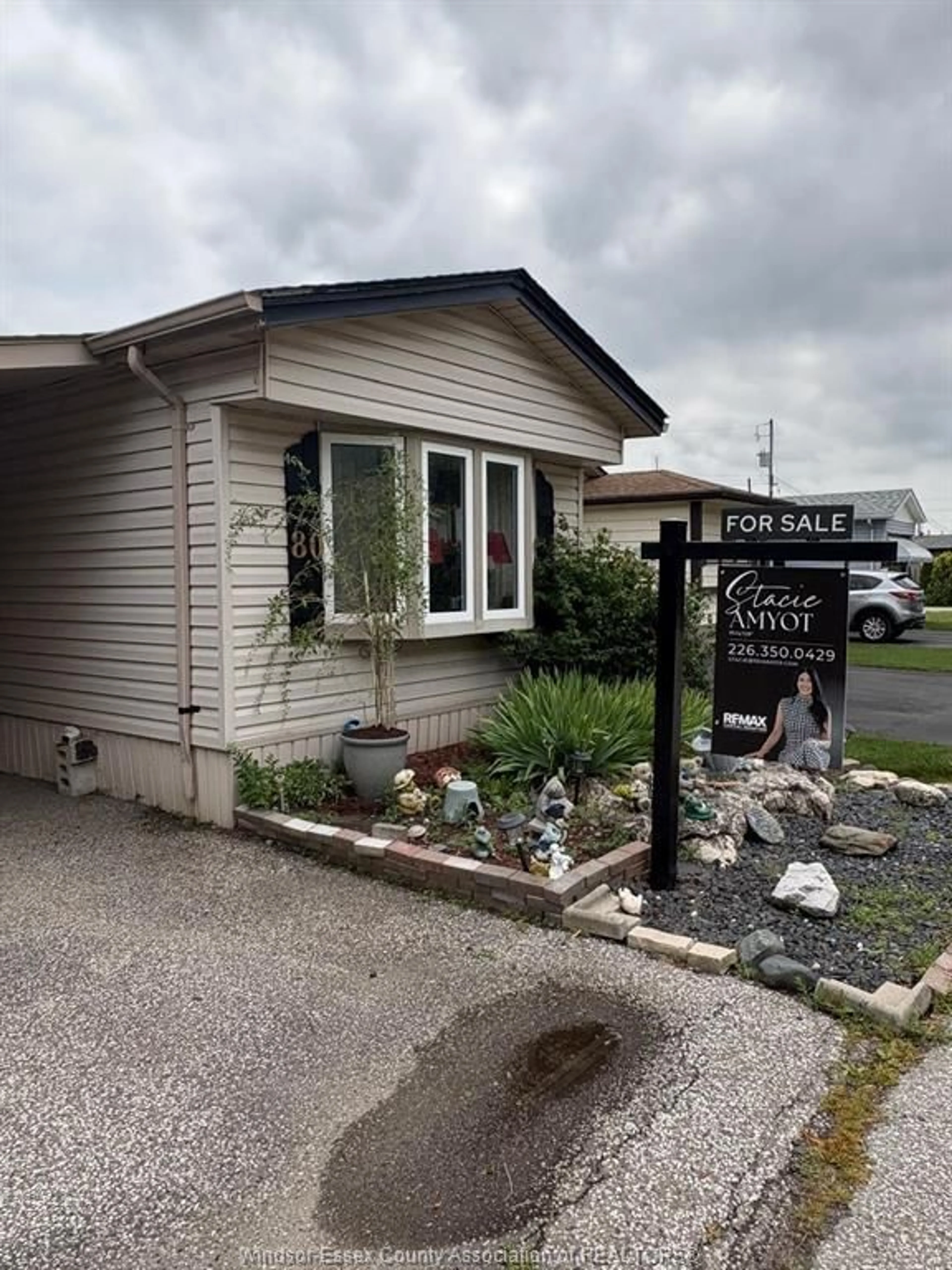Home with vinyl exterior material, street for 80 SUNCREST Dr, Lakeshore Ontario N8N 2P9