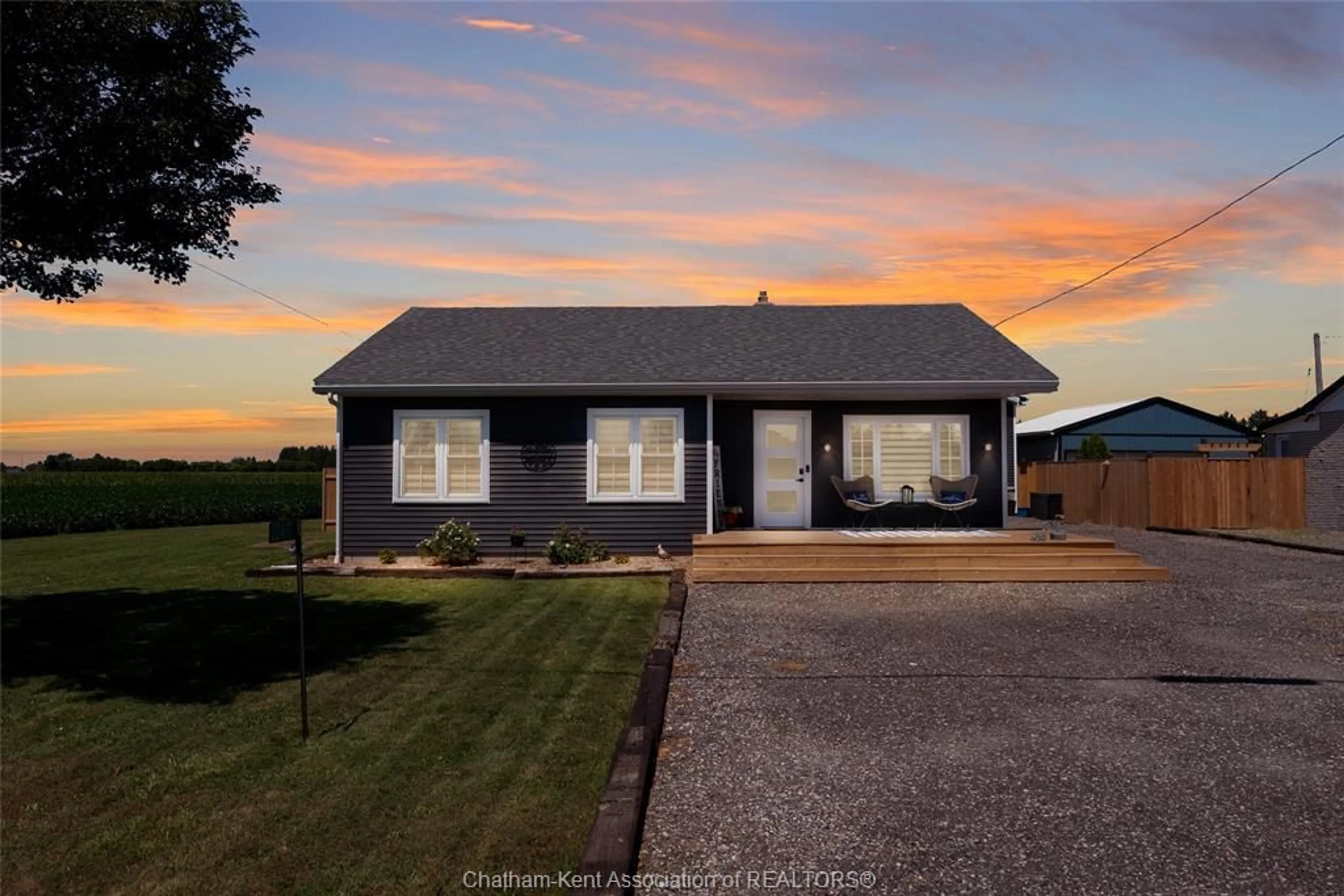 A pic from outside/outdoor area/front of a property/back of a property/a pic from drone, street for 22417 Creek Rd, Chatham Ontario N7M 5J3