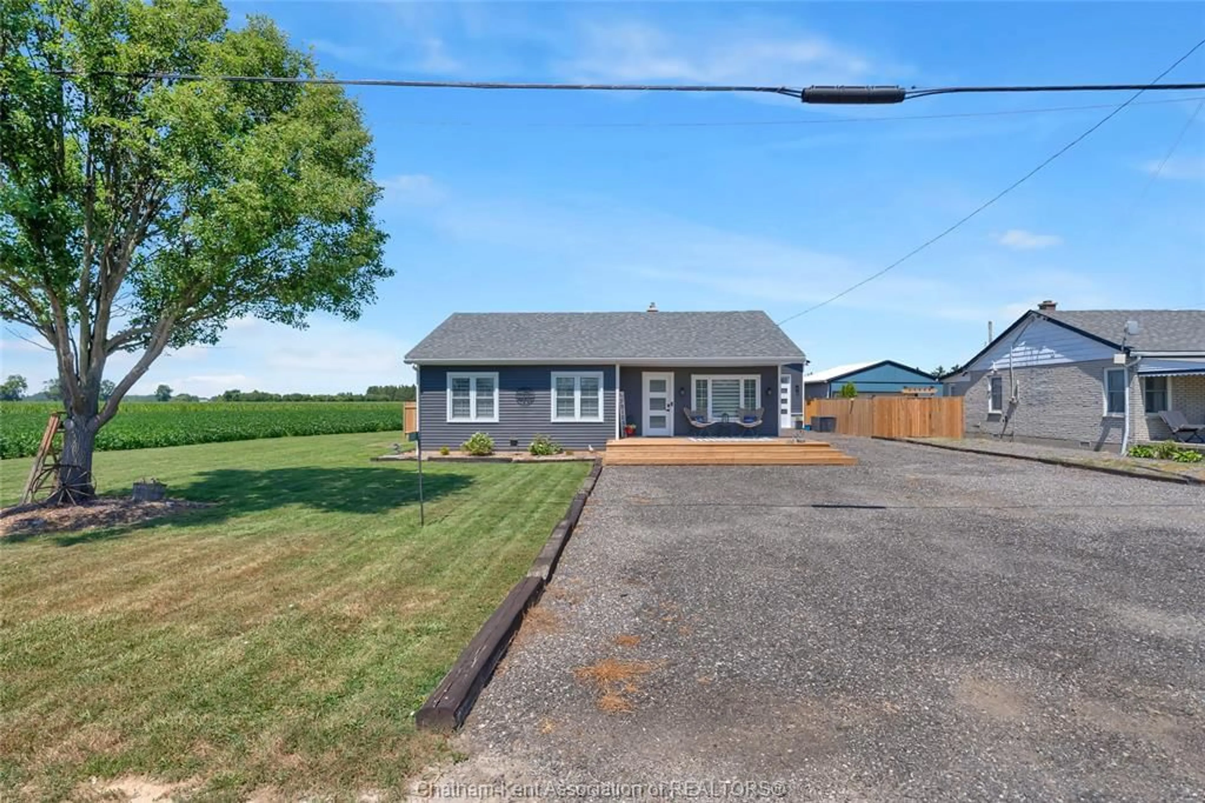A pic from outside/outdoor area/front of a property/back of a property/a pic from drone, street for 22417 Creek Rd, Chatham Ontario N7M 5J3