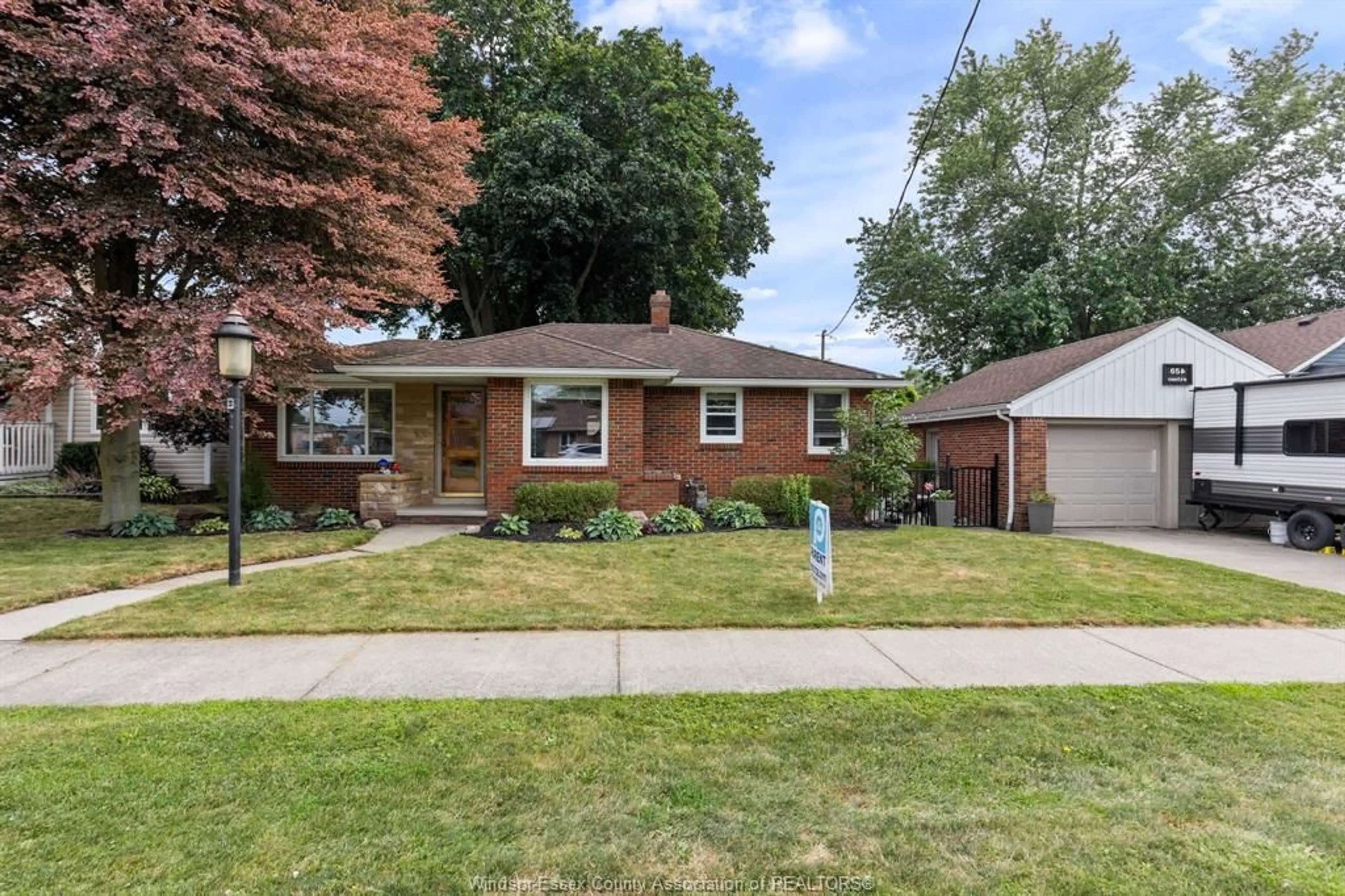 Home with brick exterior material, street for 654 CENTRE St, Belle River Ontario N0R 1A0
