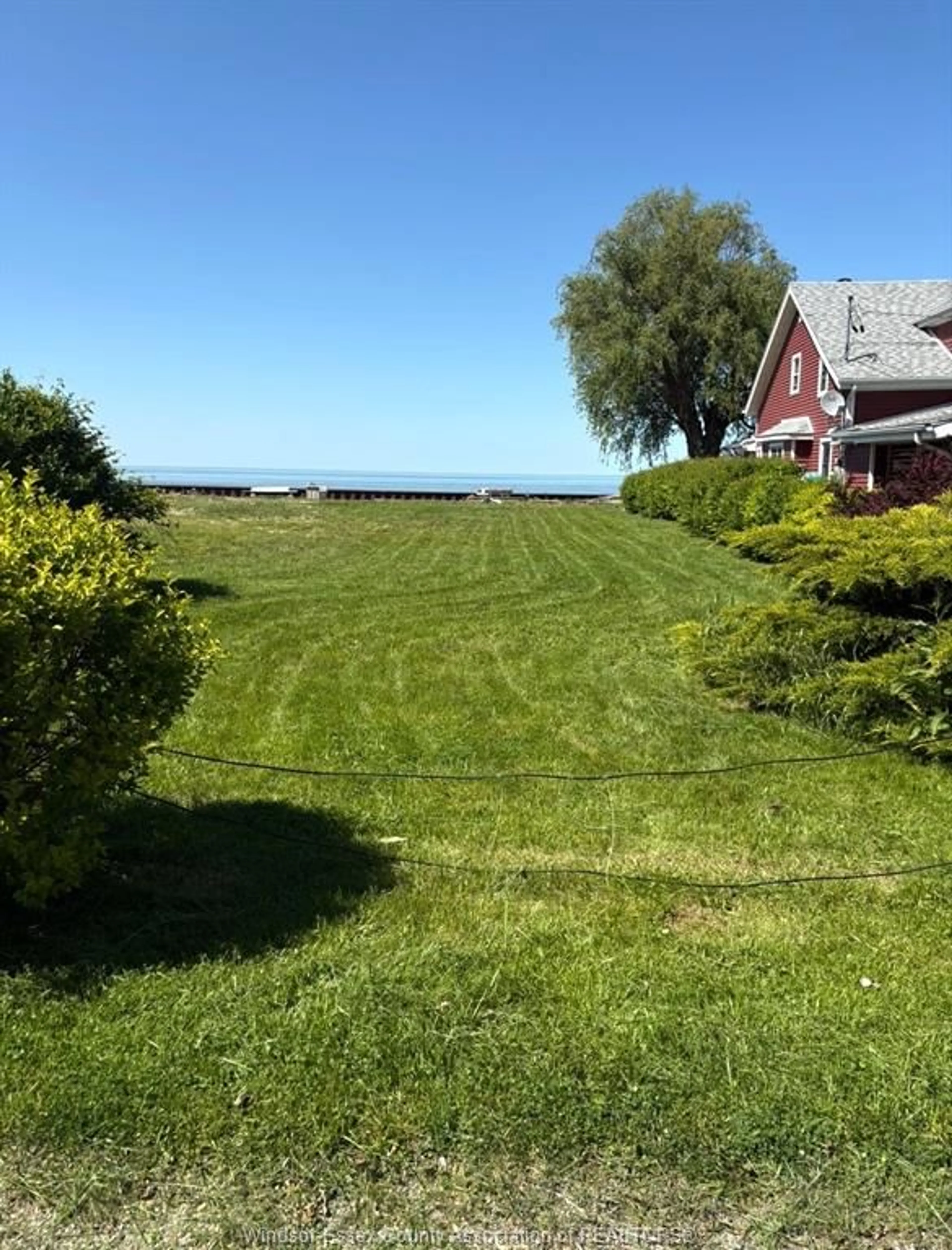 A pic from outside/outdoor area/front of a property/back of a property/a pic from drone, water/lake/river/ocean view for 1310 SHORELINE, Lakeshore Ontario N8L 0H7