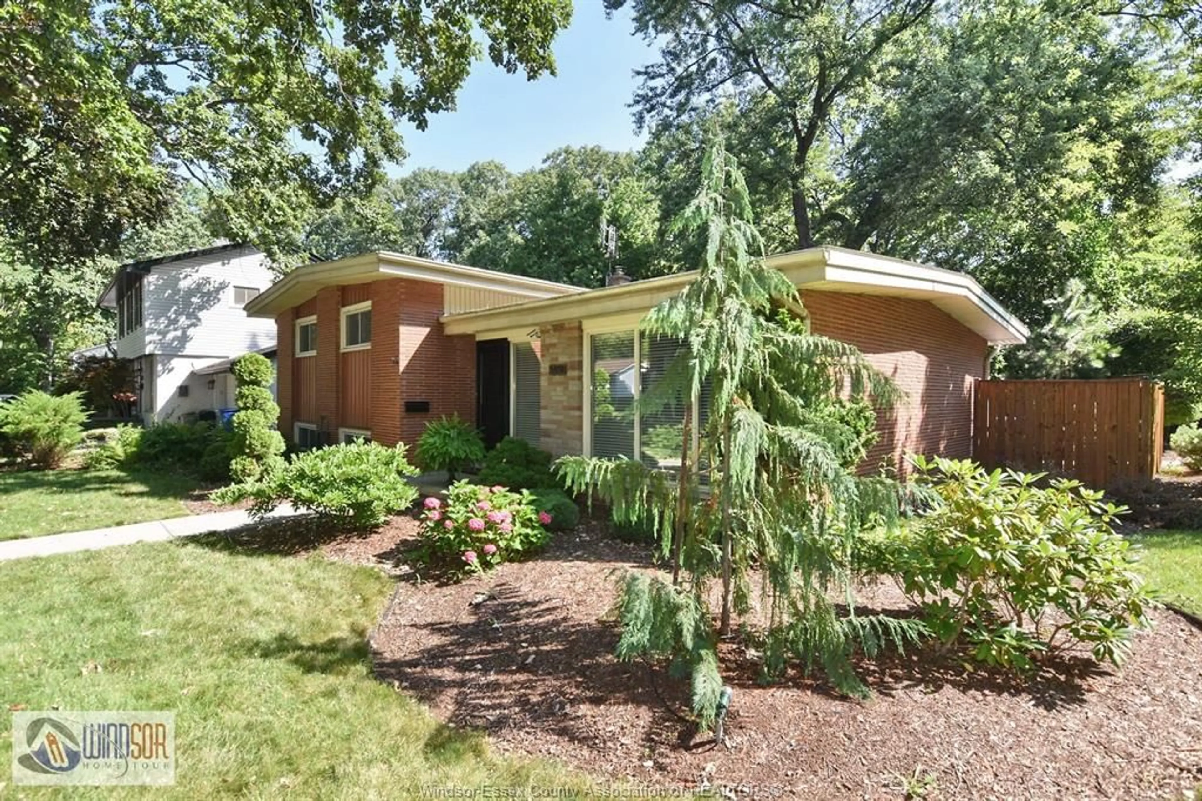 Home with brick exterior material, street for 3490 ST. PATRICKS Dr, Windsor Ontario N9E 3H4