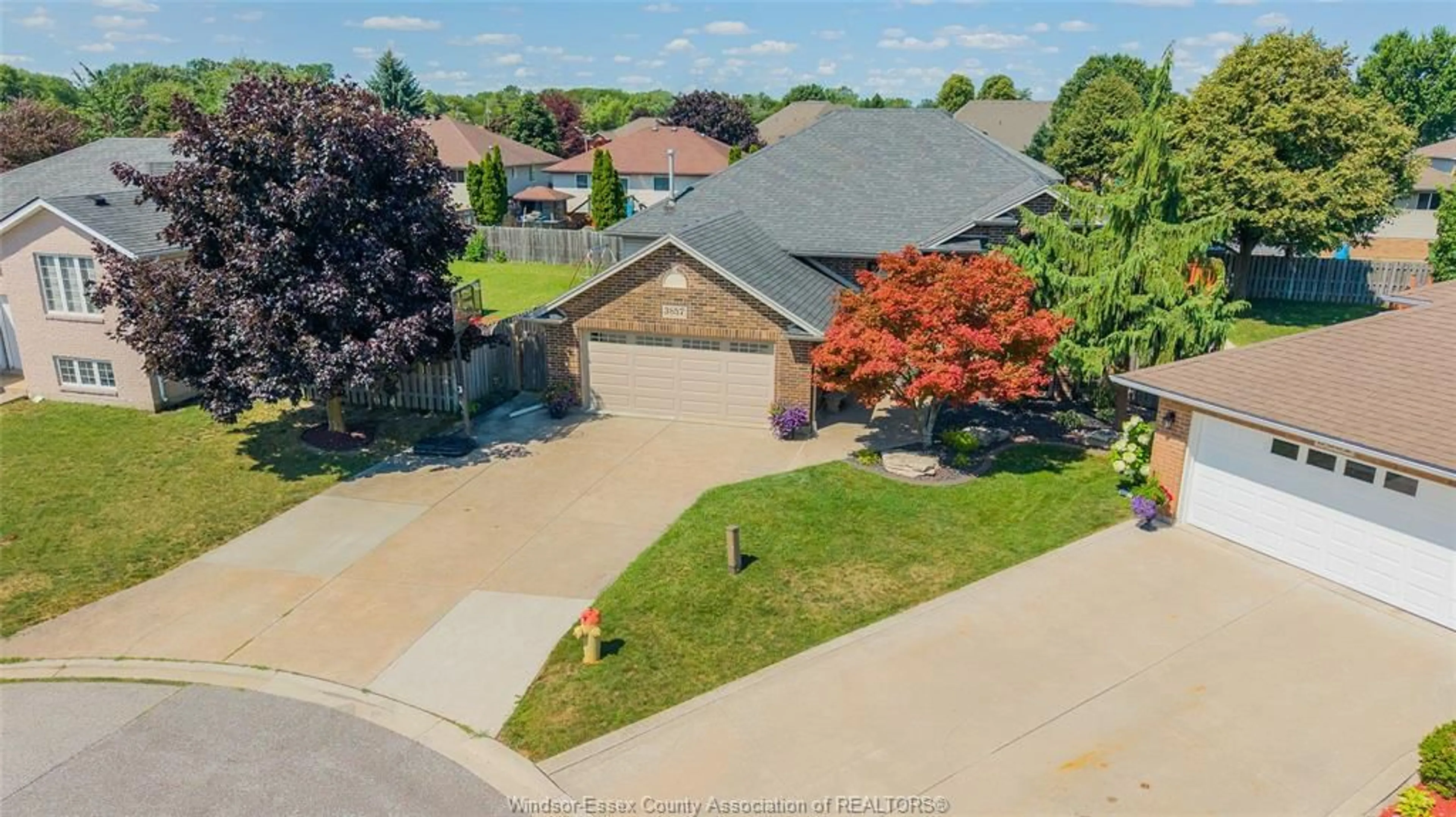 A pic from outside/outdoor area/front of a property/back of a property/a pic from drone, street for 3857 SOCRATES Crt, Windsor Ontario N9G 2P2