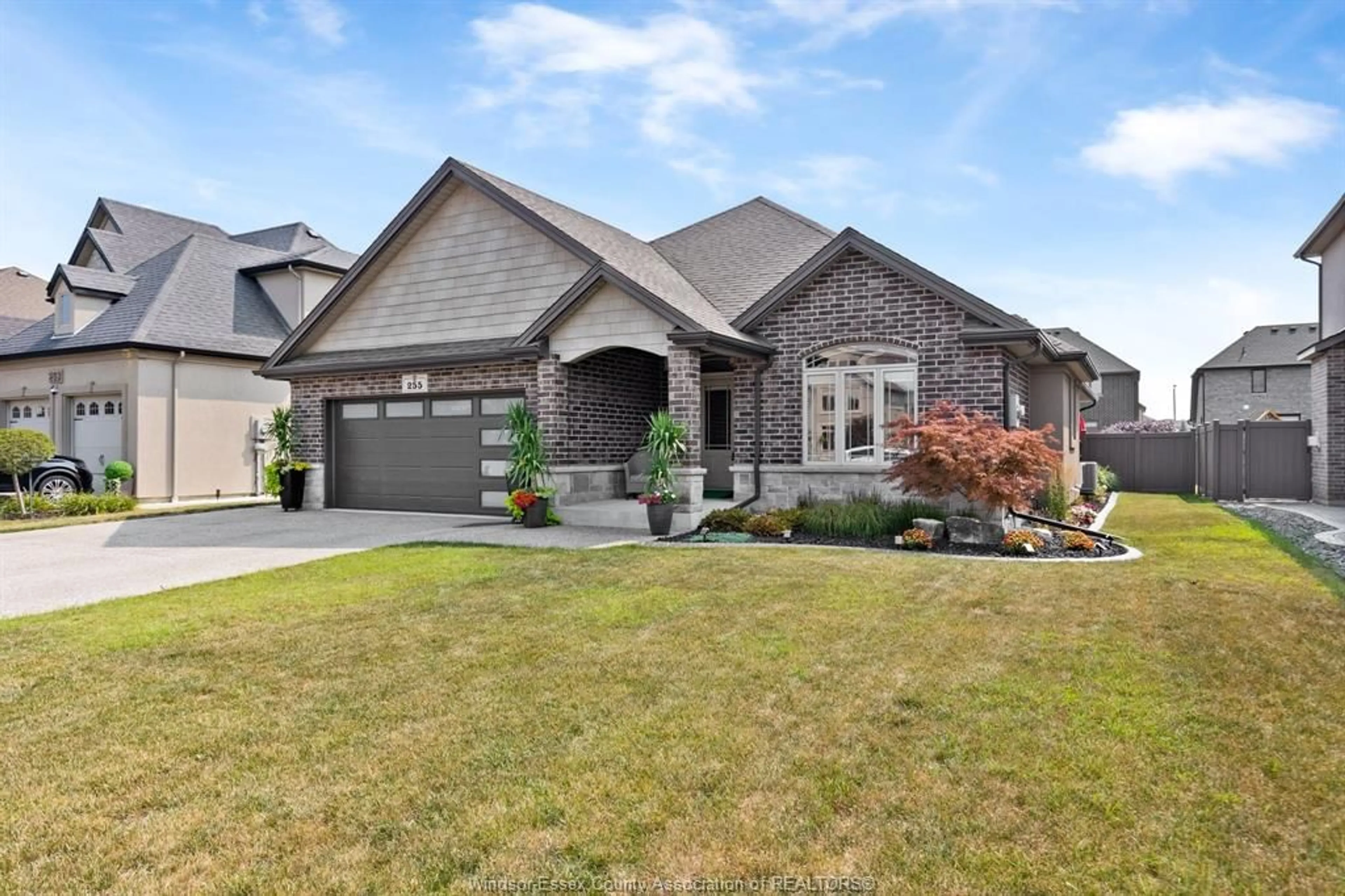 Home with brick exterior material, street for 255 MAXWELL Cres, Lakeshore Ontario N0R 1A0