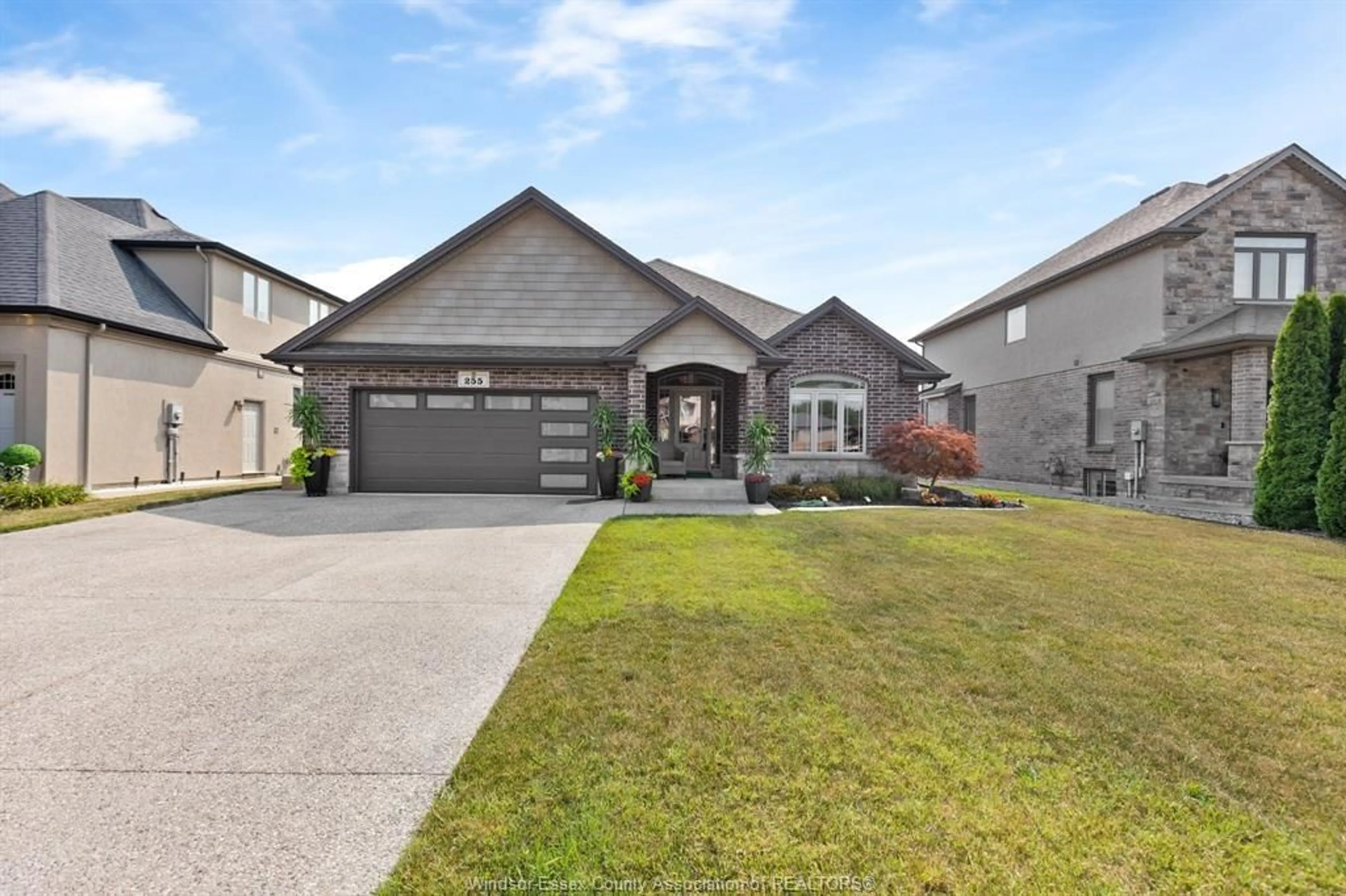 Home with brick exterior material, street for 255 MAXWELL Cres, Lakeshore Ontario N0R 1A0