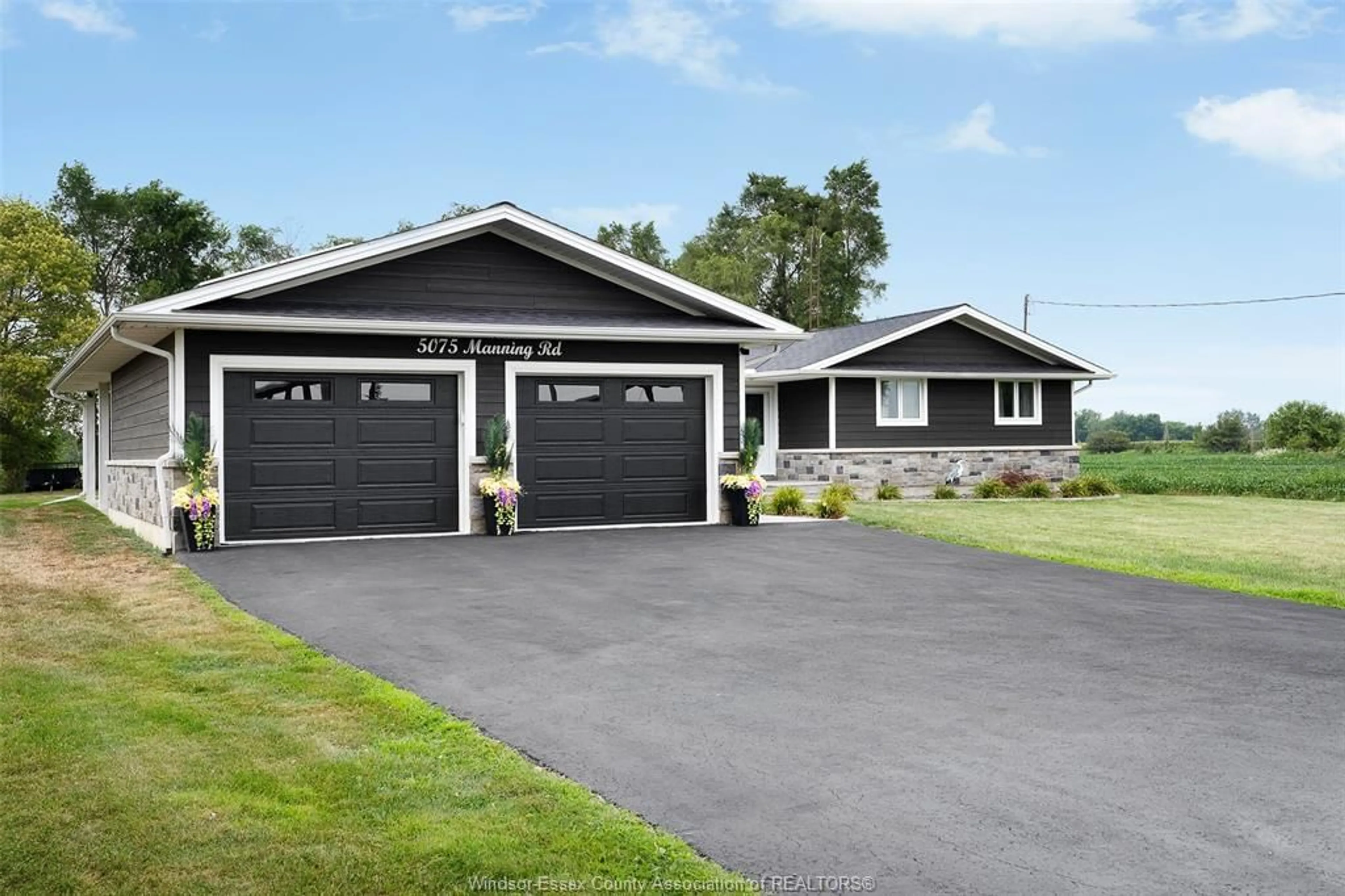 Home with vinyl exterior material, street for 5075 MANNING Rd, Tecumseh Ontario N0R 1K0