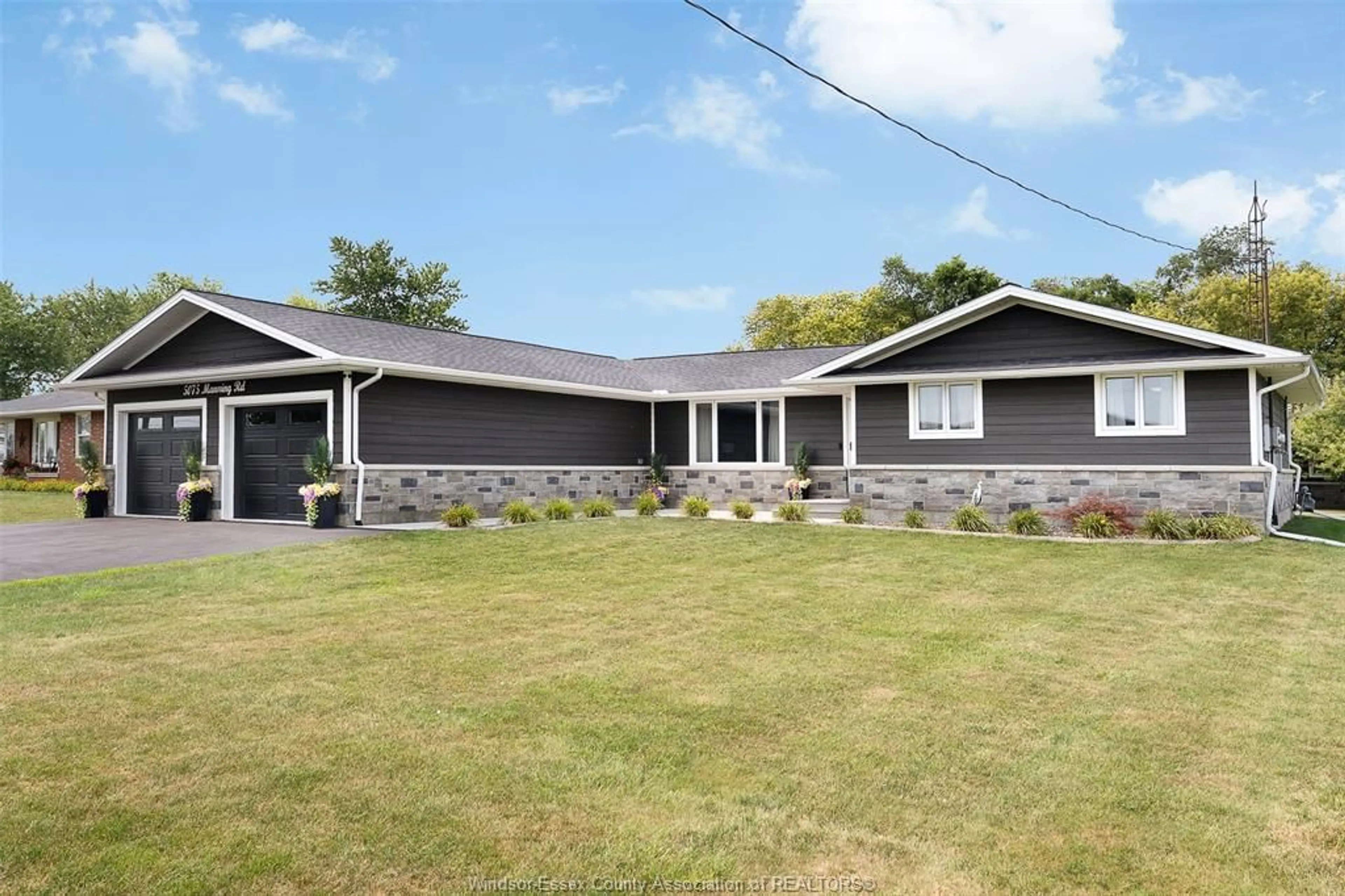 Home with vinyl exterior material, street for 5075 MANNING Rd, Tecumseh Ontario N0R 1K0