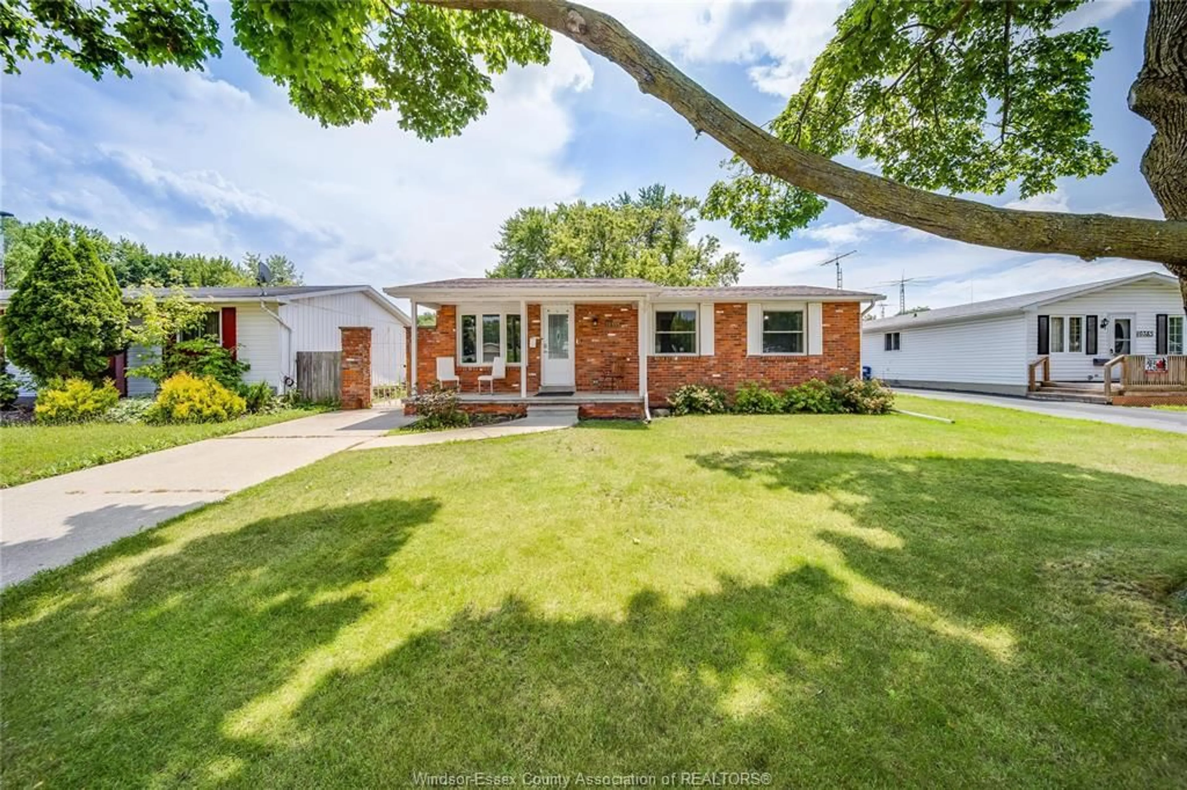 Home with brick exterior material, street for 10395 CALEDON Crt, Windsor Ontario N8R 1C7