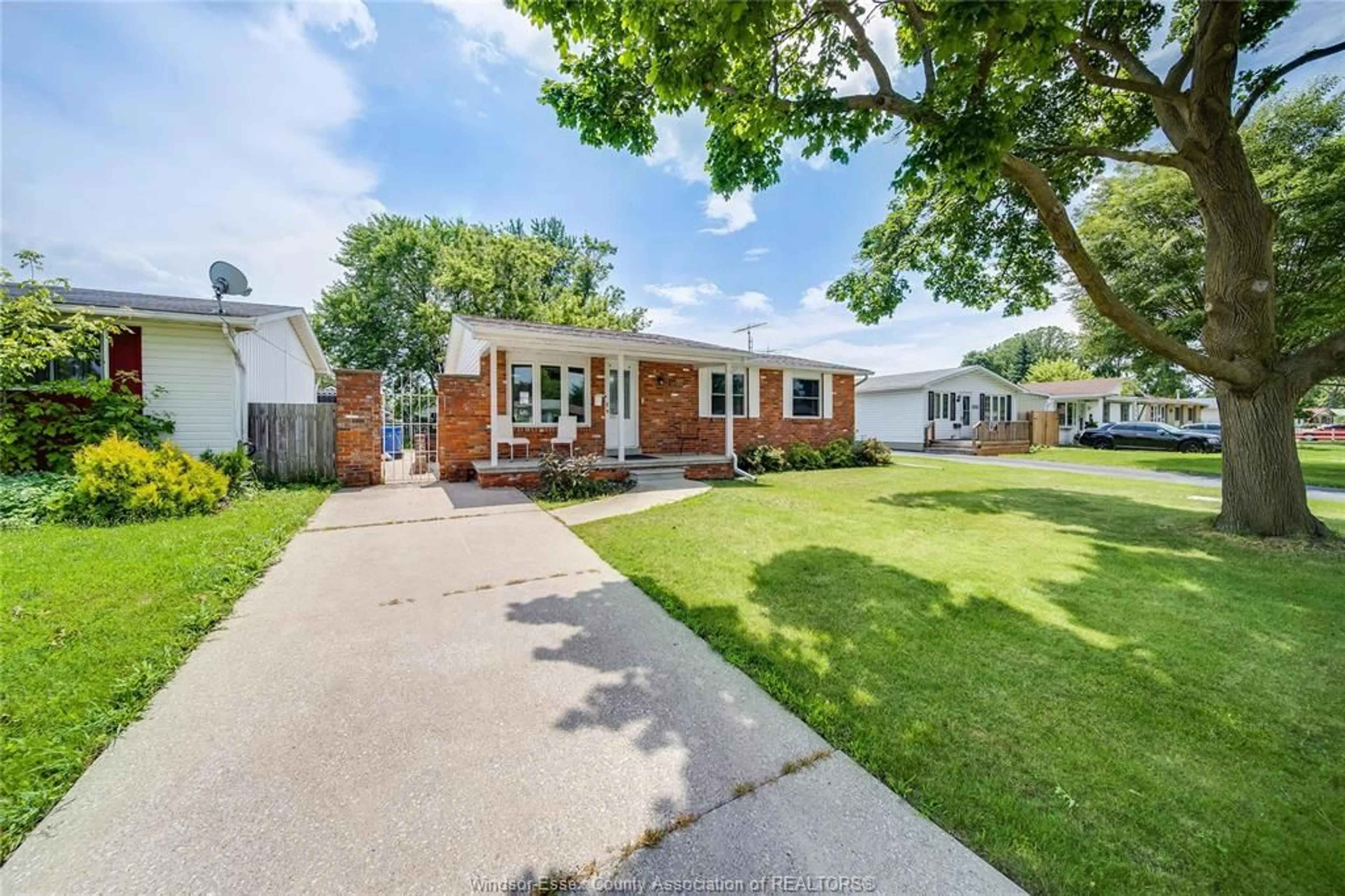 Home with brick exterior material, street for 10395 CALEDON Crt, Windsor Ontario N8R 1C7