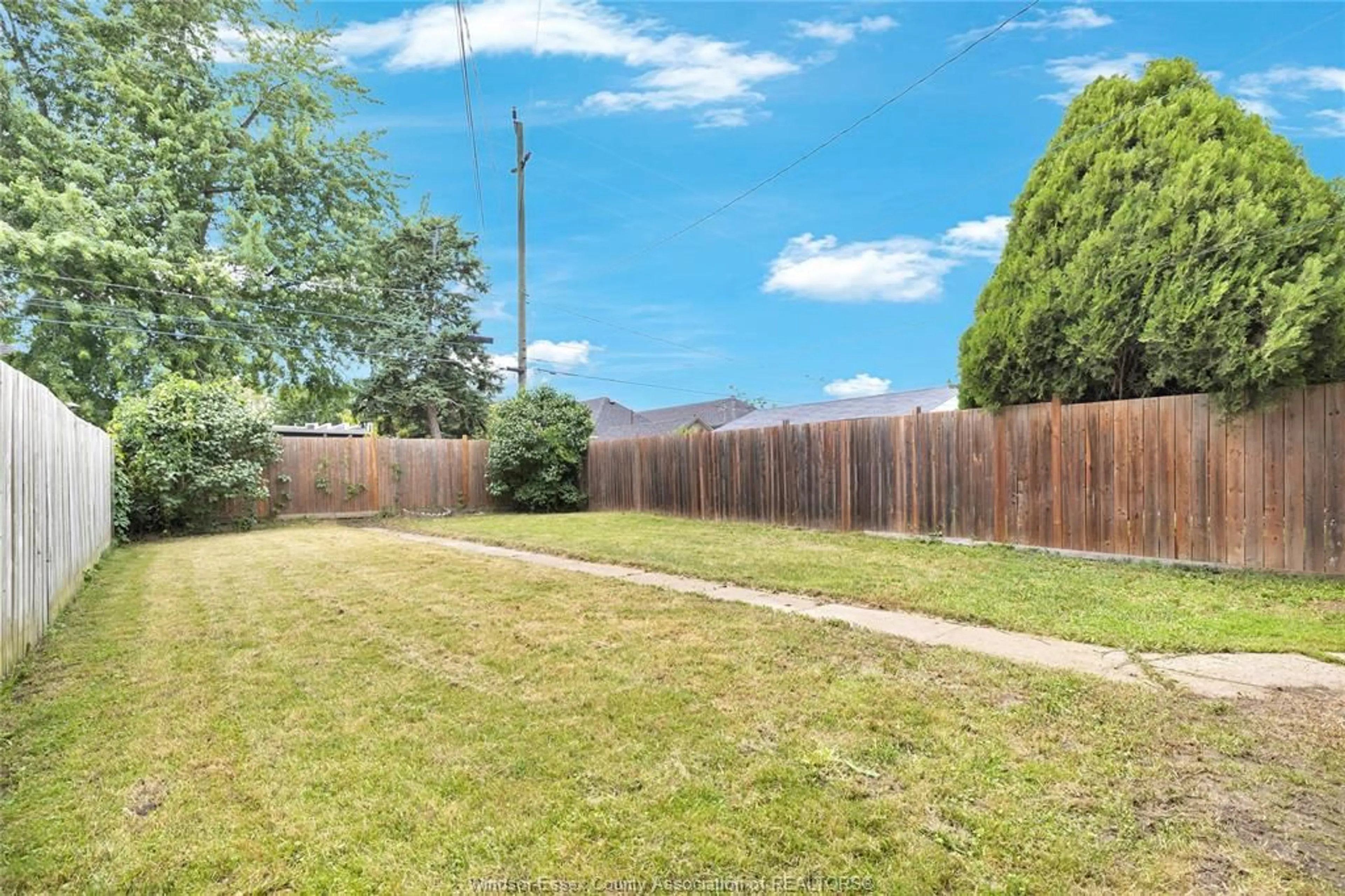 A pic from outside/outdoor area/front of a property/back of a property/a pic from drone, mountain view for 1451 HENRY FORD CENTRE Dr, Windsor Ontario N8Y 2V2