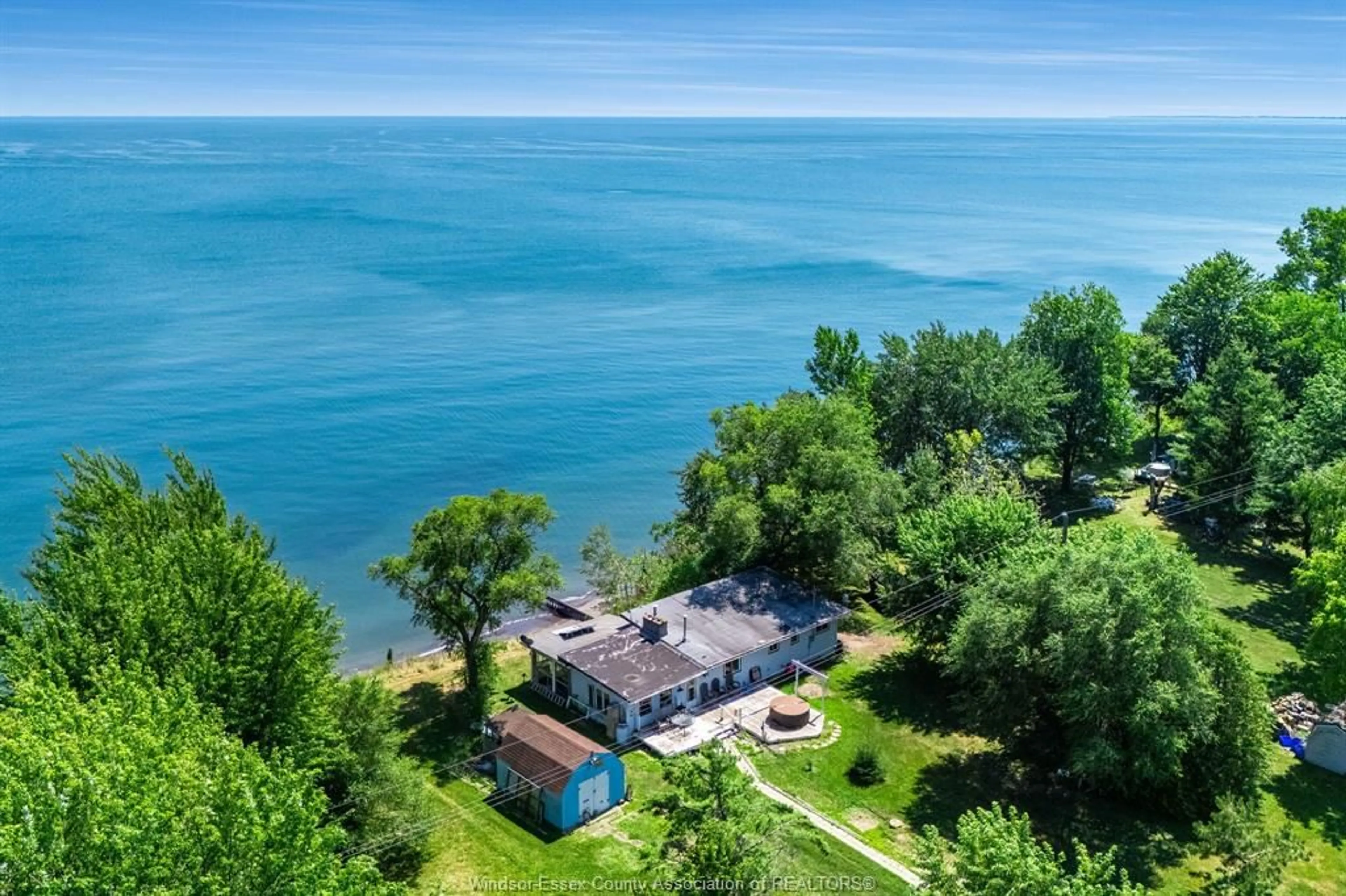 A pic from outside/outdoor area/front of a property/back of a property/a pic from drone, water/lake/river/ocean view for 1624 Tilton Line, Wheatley Ontario N0P 2P0