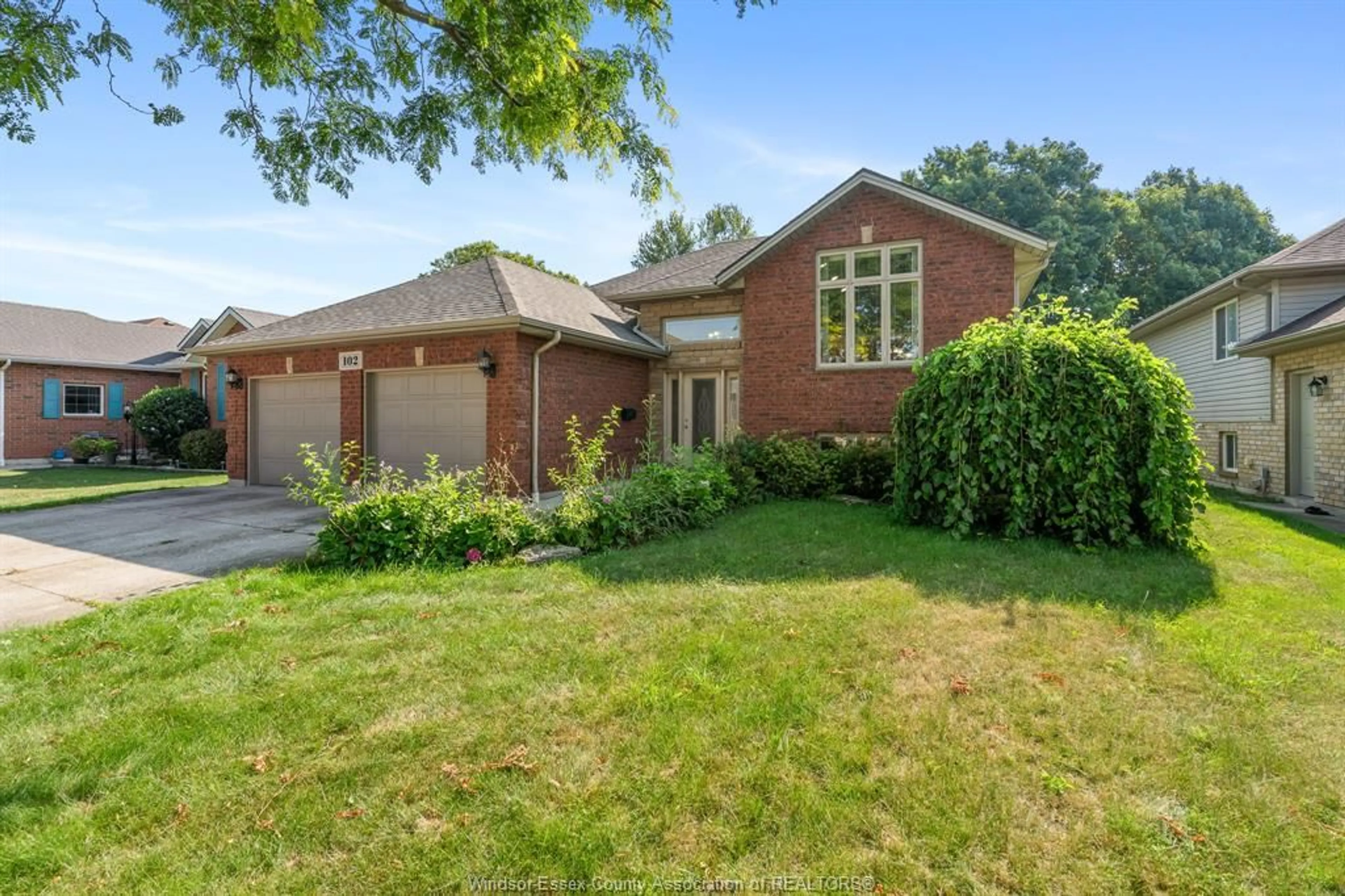 Home with brick exterior material, street for 102 Joanne Crt, Leamington Ontario N8H 5N5