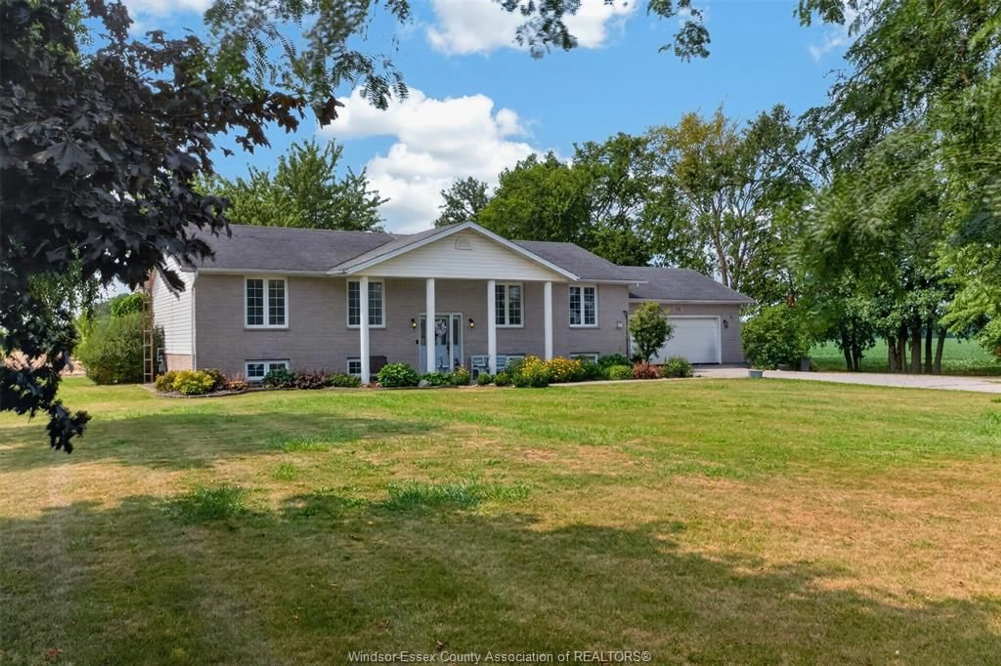 A pic from outside/outdoor area/front of a property/back of a property/a pic from drone, unknown for 124 COUNTY RD 14, Gosfield North Ontario N0R 1B0
