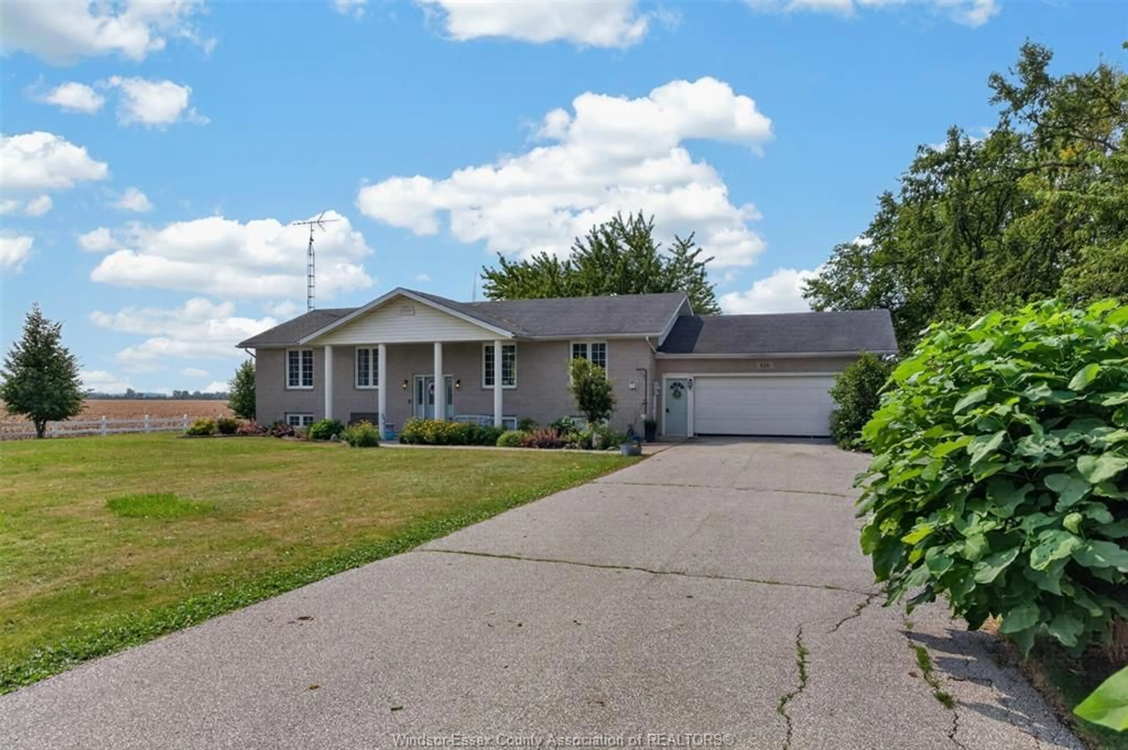 A pic from outside/outdoor area/front of a property/back of a property/a pic from drone, water/lake/river/ocean view for 124 COUNTY RD 14, Gosfield North Ontario N0R 1B0