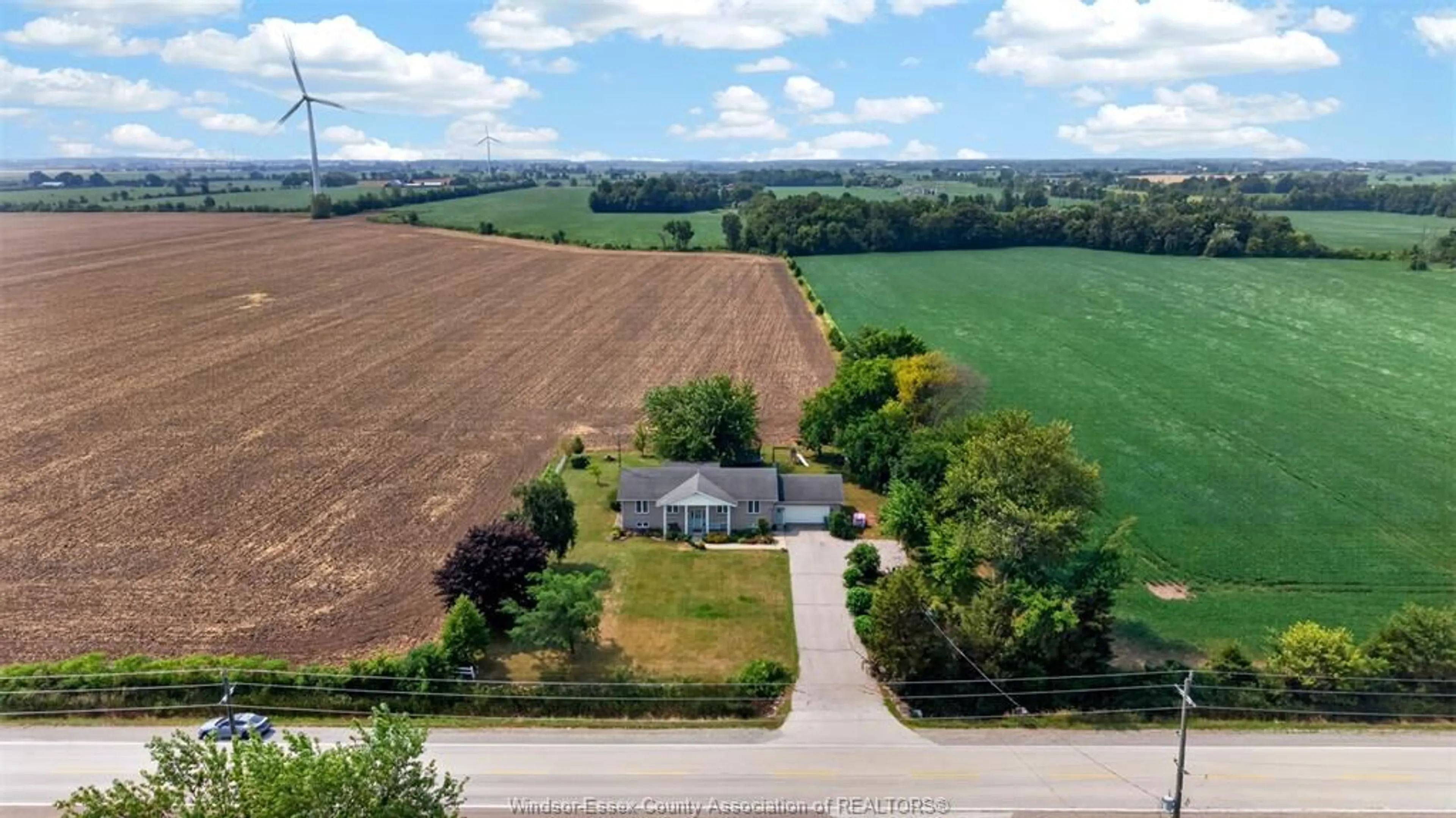A pic from outside/outdoor area/front of a property/back of a property/a pic from drone, unknown for 124 COUNTY RD 14, Gosfield North Ontario N0R 1B0
