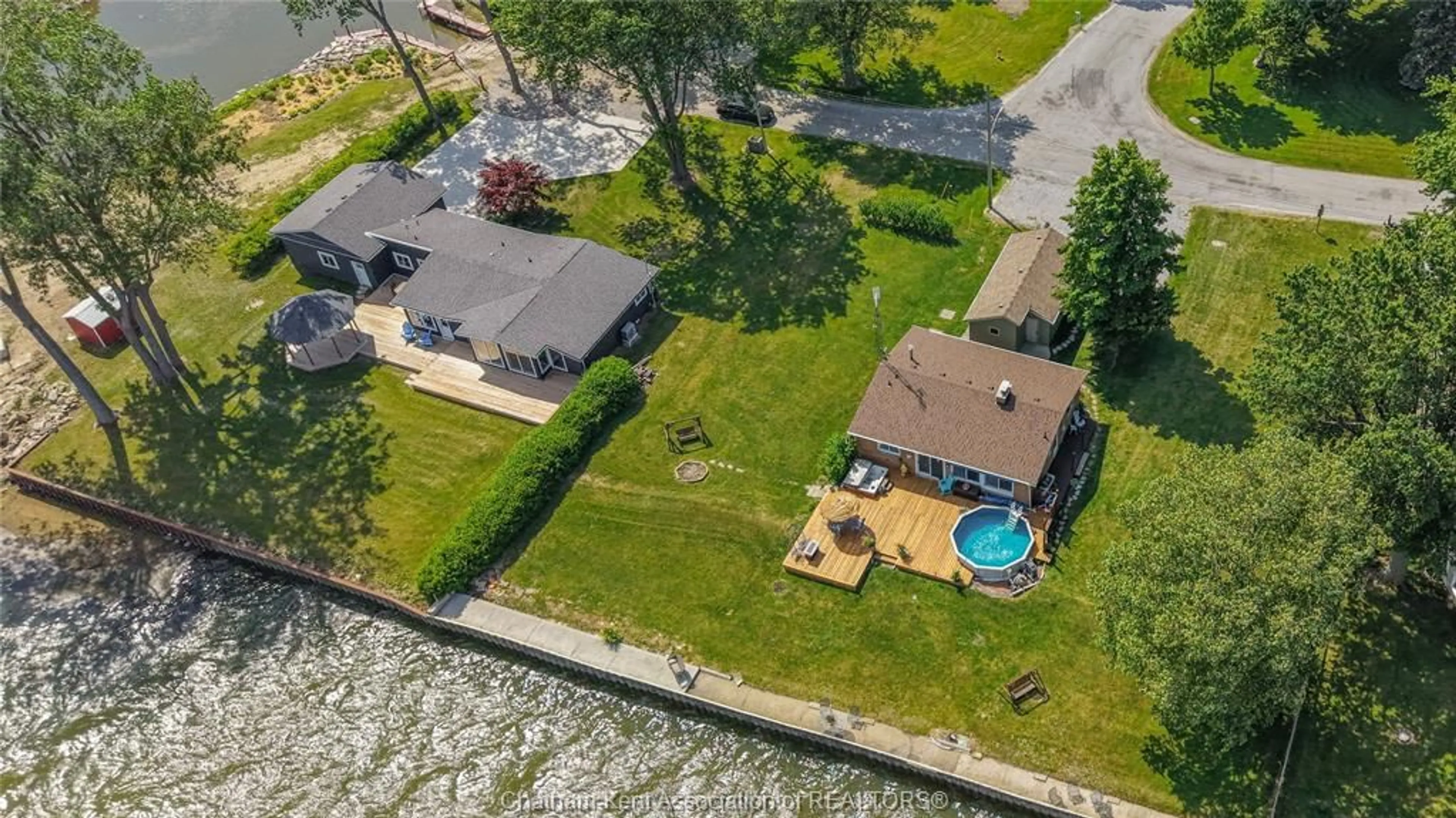 A pic from outside/outdoor area/front of a property/back of a property/a pic from drone, water/lake/river/ocean view for 85 ISLAND Cres, Lighthouse Cove Ontario N0P 2L0
