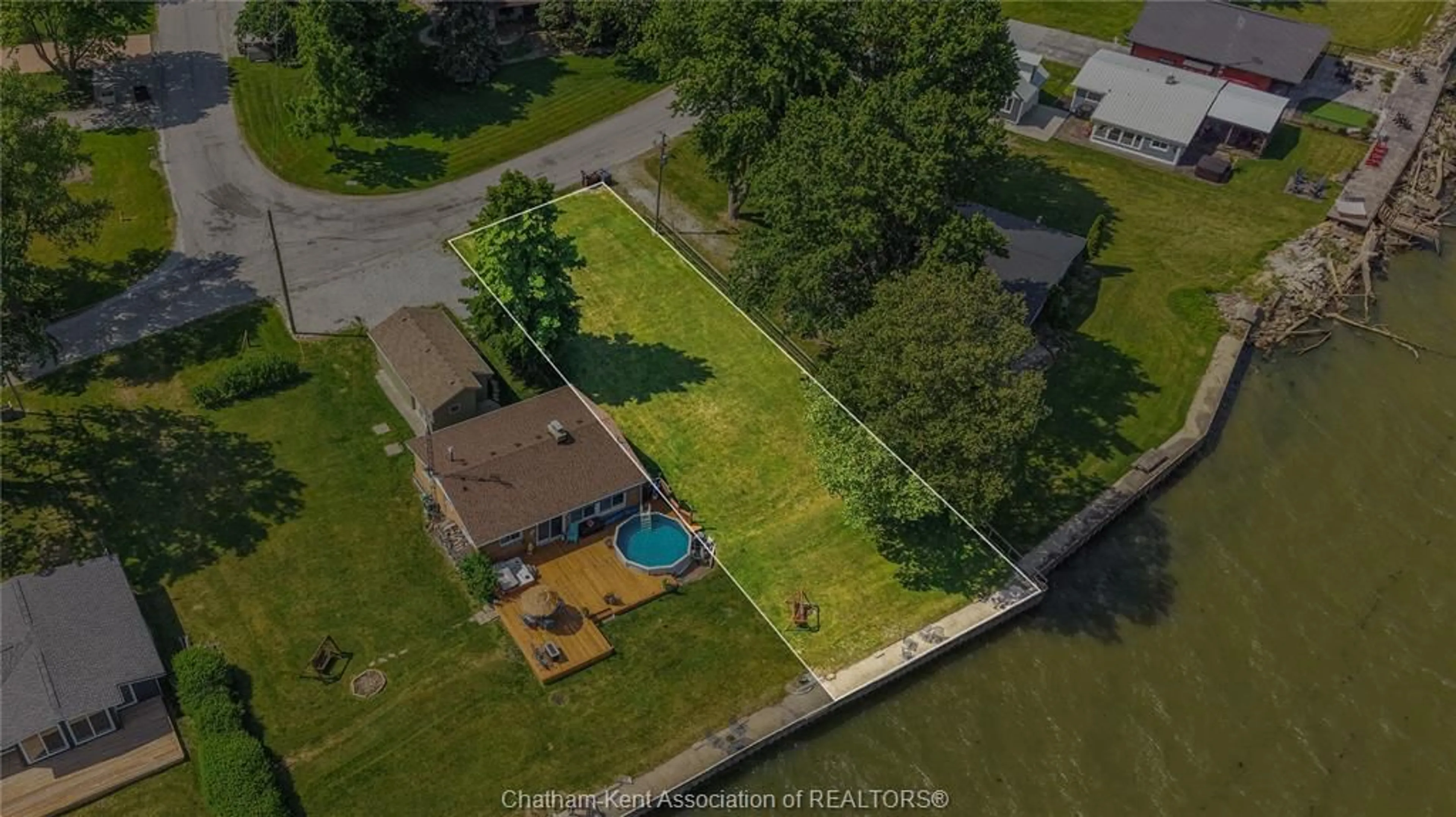 A pic from outside/outdoor area/front of a property/back of a property/a pic from drone, water/lake/river/ocean view for 105 ISLAND Cres, Lighthouse Cove Ontario N0P 2L0