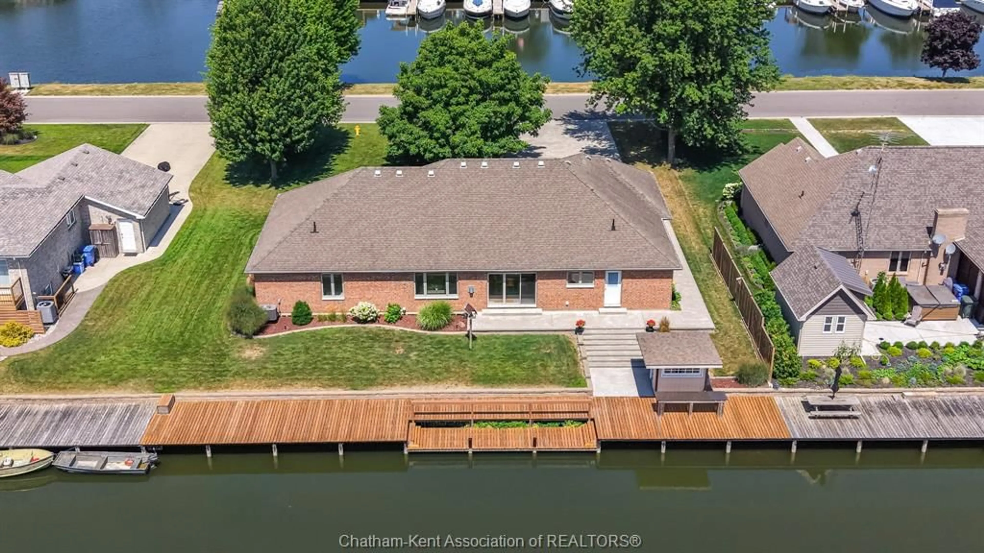 A pic from outside/outdoor area/front of a property/back of a property/a pic from drone, water/lake/river/ocean view for 19045 CREST RIVER Ave, Lighthouse Cove Ontario N0P 2L0
