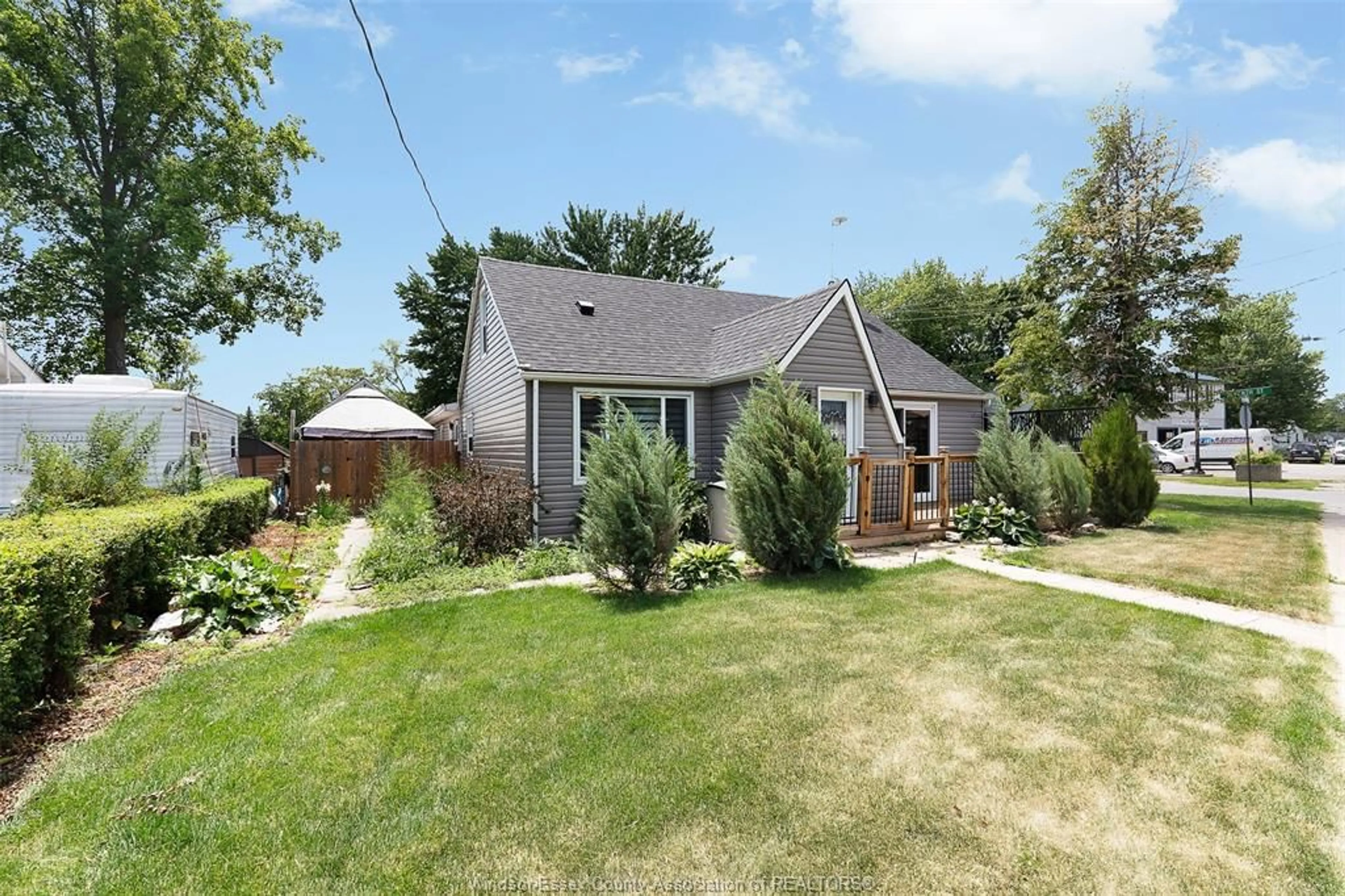 A pic from outside/outdoor area/front of a property/back of a property/a pic from drone, street for 430 BROADWAY St, Belle River Ontario N0R 1A0