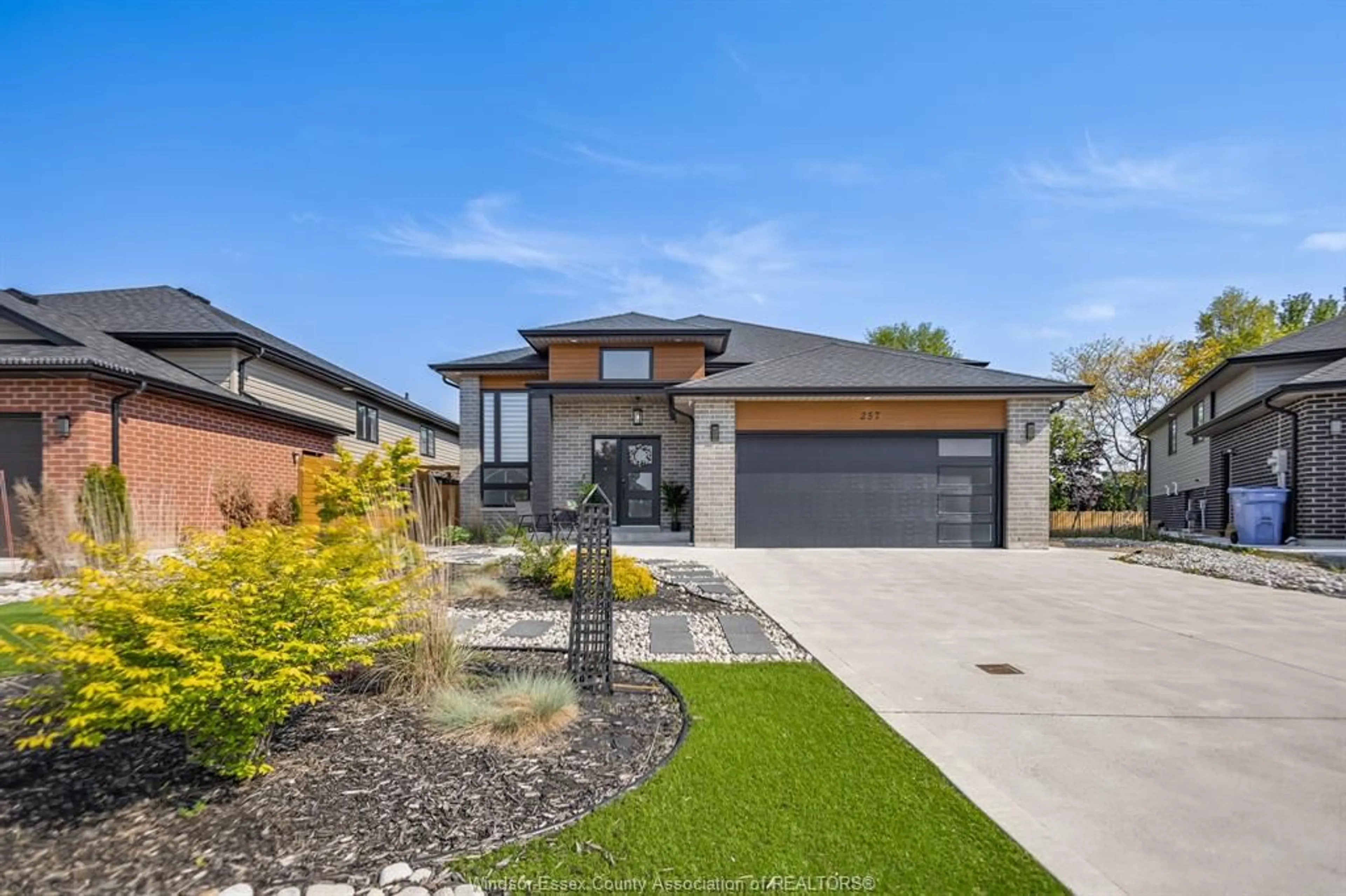 Home with brick exterior material, street for 257 ROBINSON Ave, Essex Ontario N8M 0A8