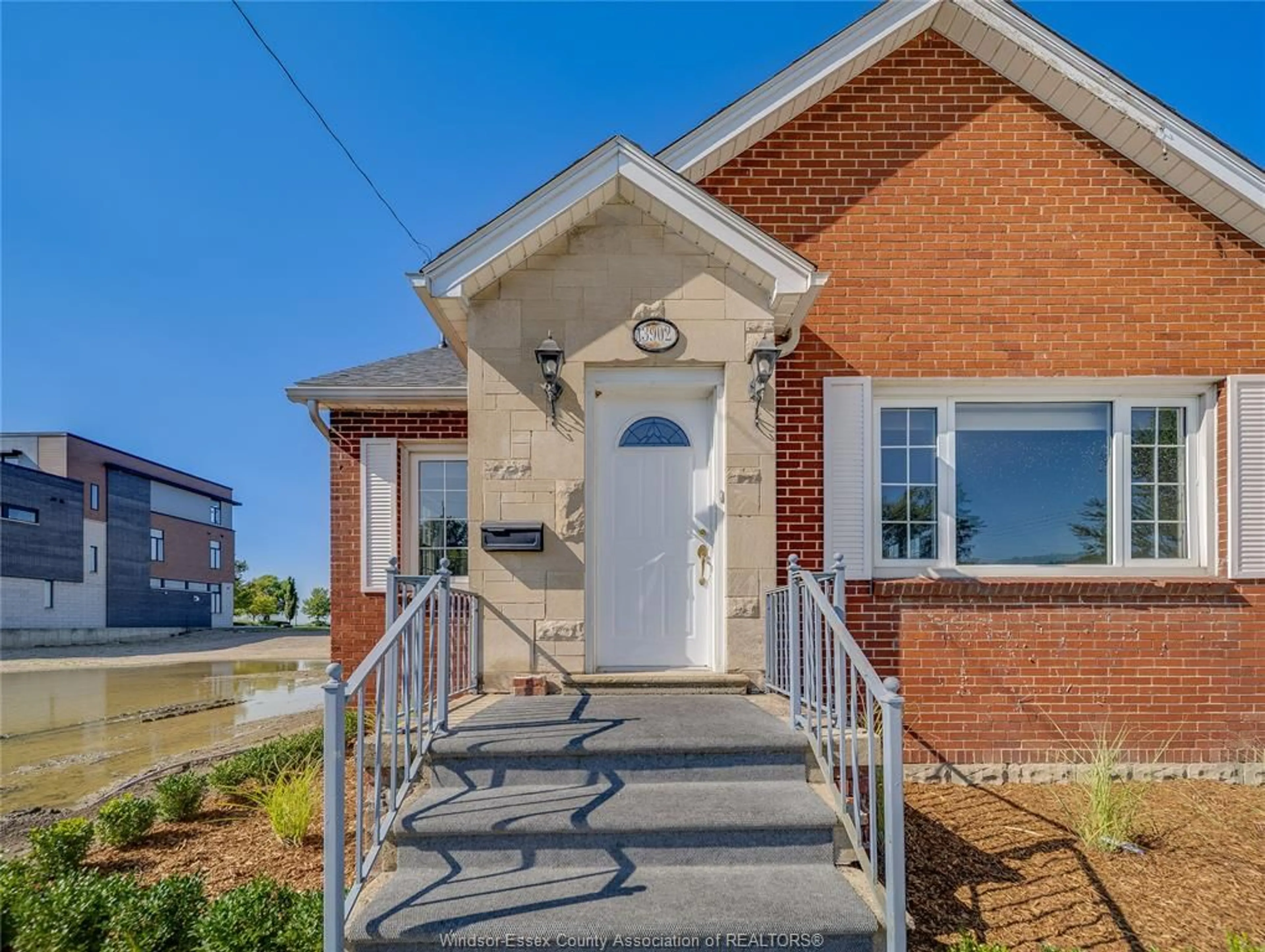 Home with brick exterior material, street for 13902 RIVERSIDE Dr, Tecumseh Ontario N8W 1B6