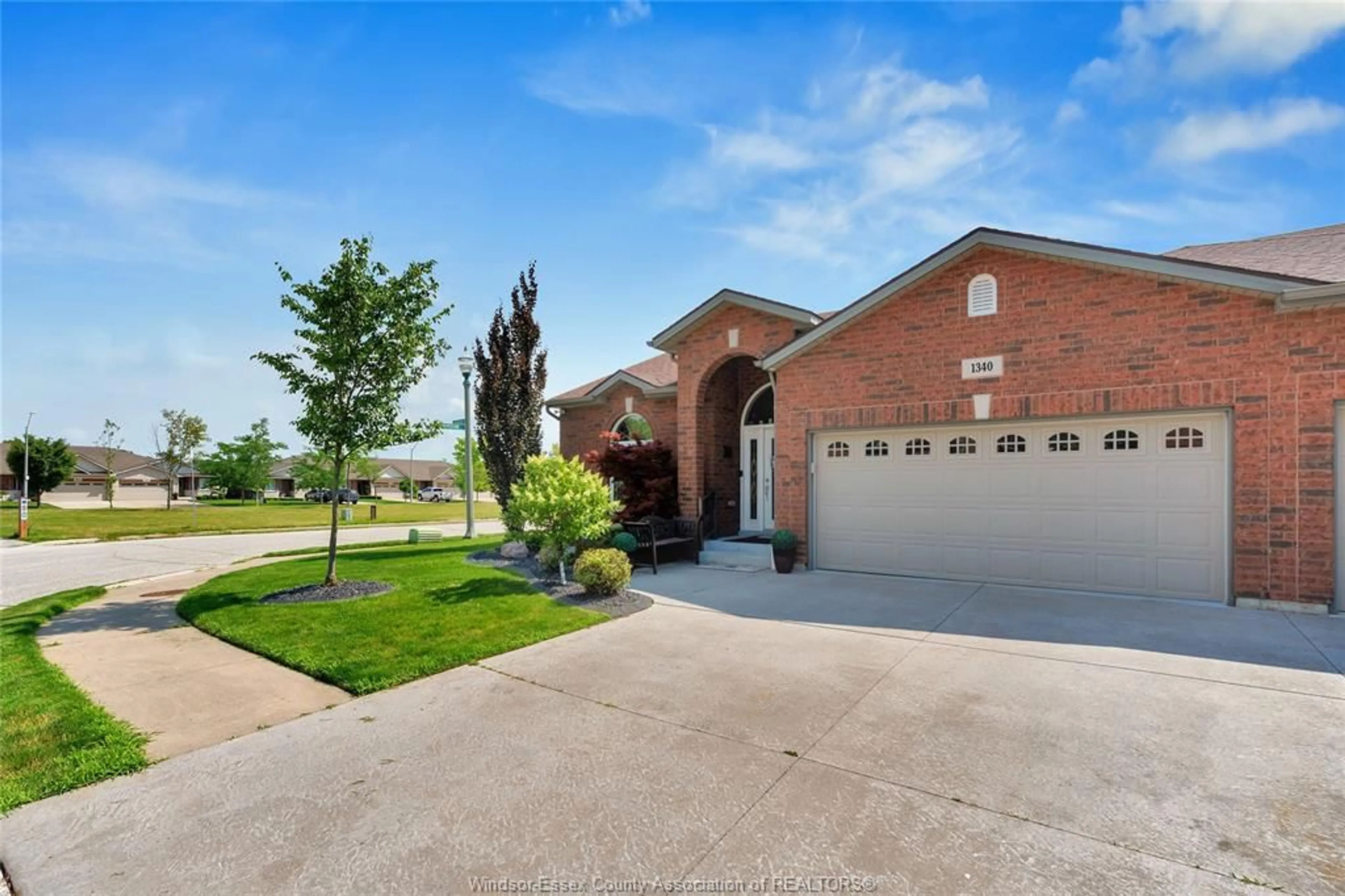 Home with brick exterior material, street for 1340 ASPENSHORE Ave, Windsor Ontario N8P 1Y4