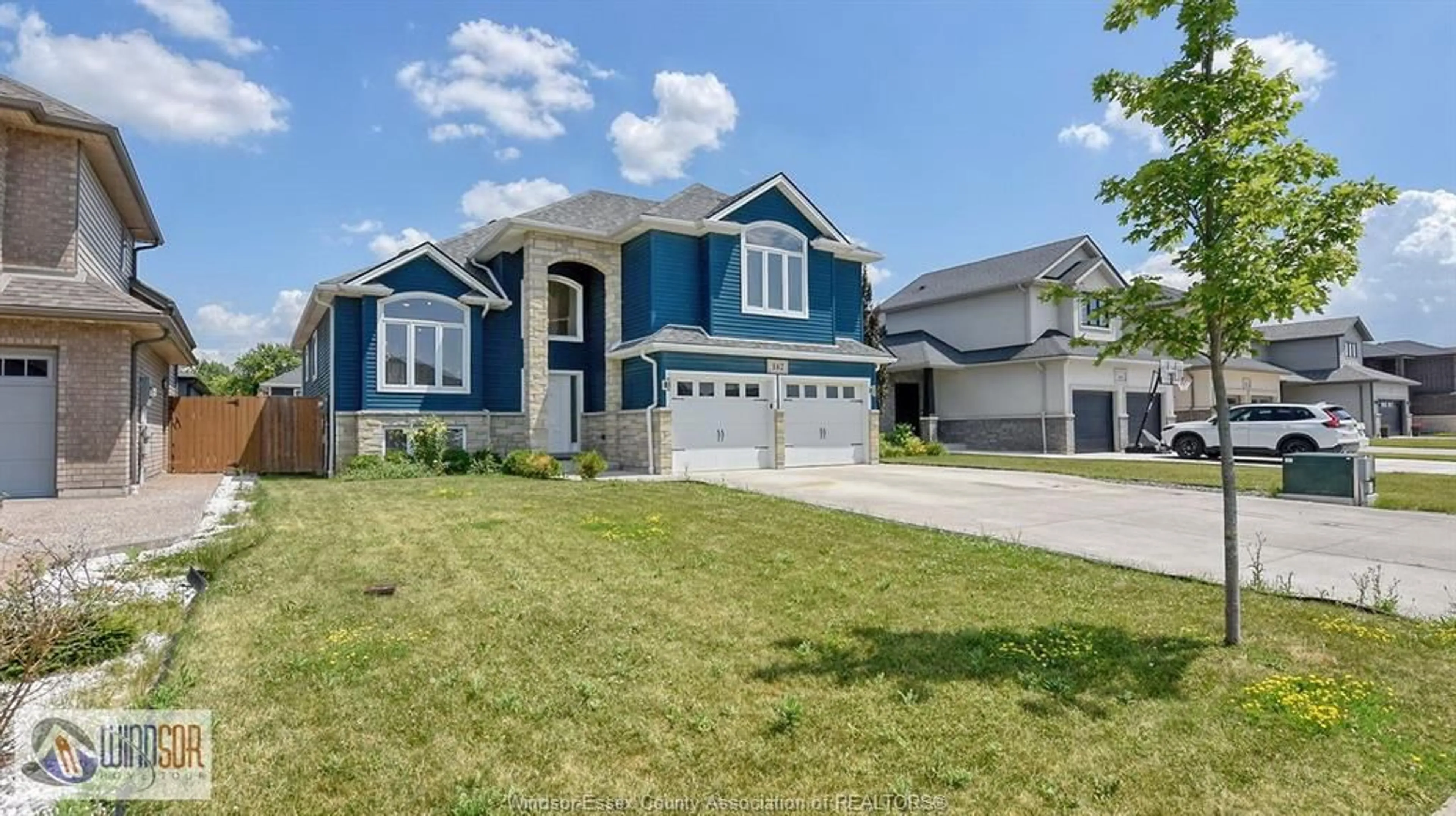 Home with vinyl exterior material, street for 142 SUMMER St, Belle River Ontario N0R 1A0
