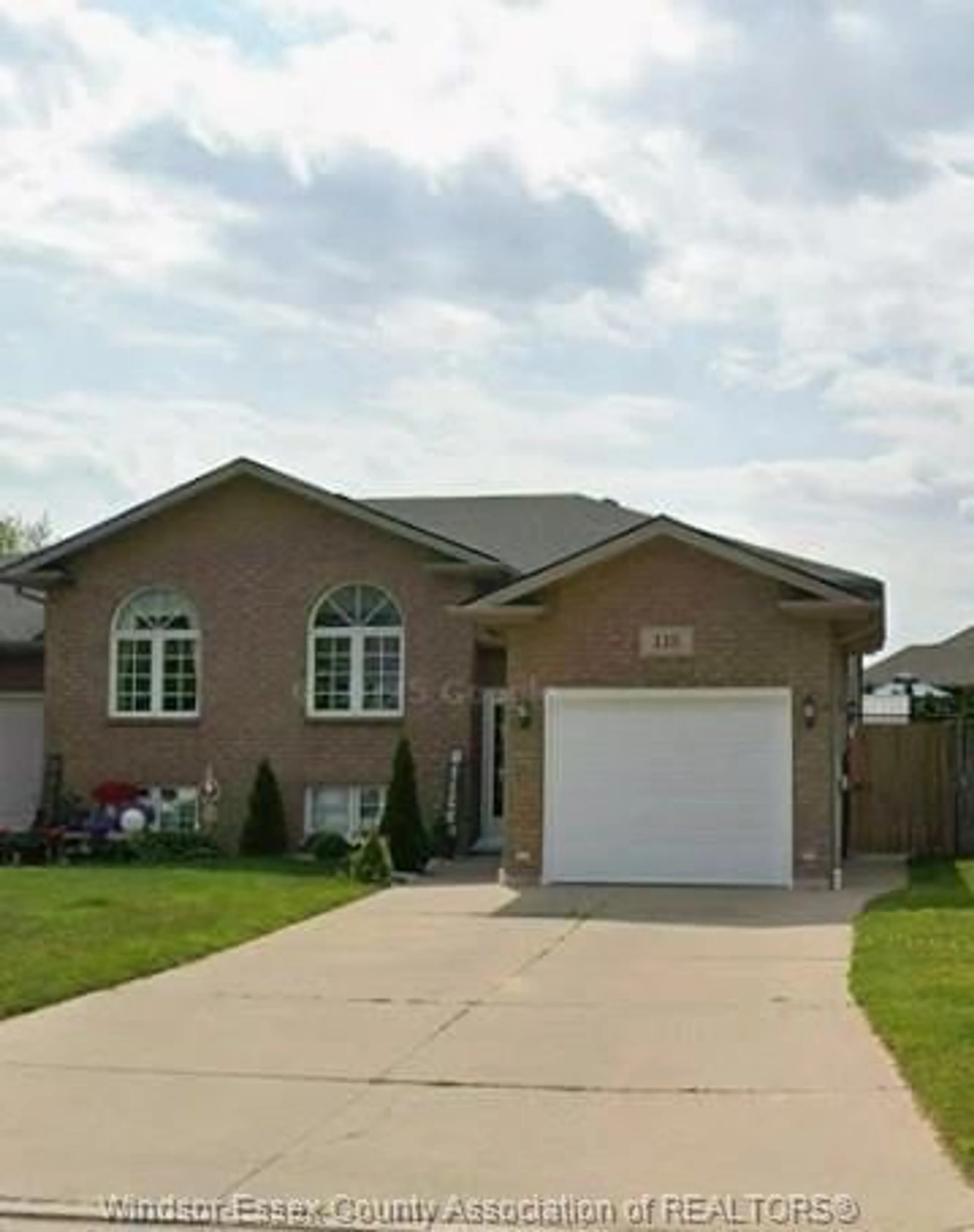 Home with brick exterior material, street for 118 Sturgeon Meadows Ave, Leamington Ontario N8H 5L1
